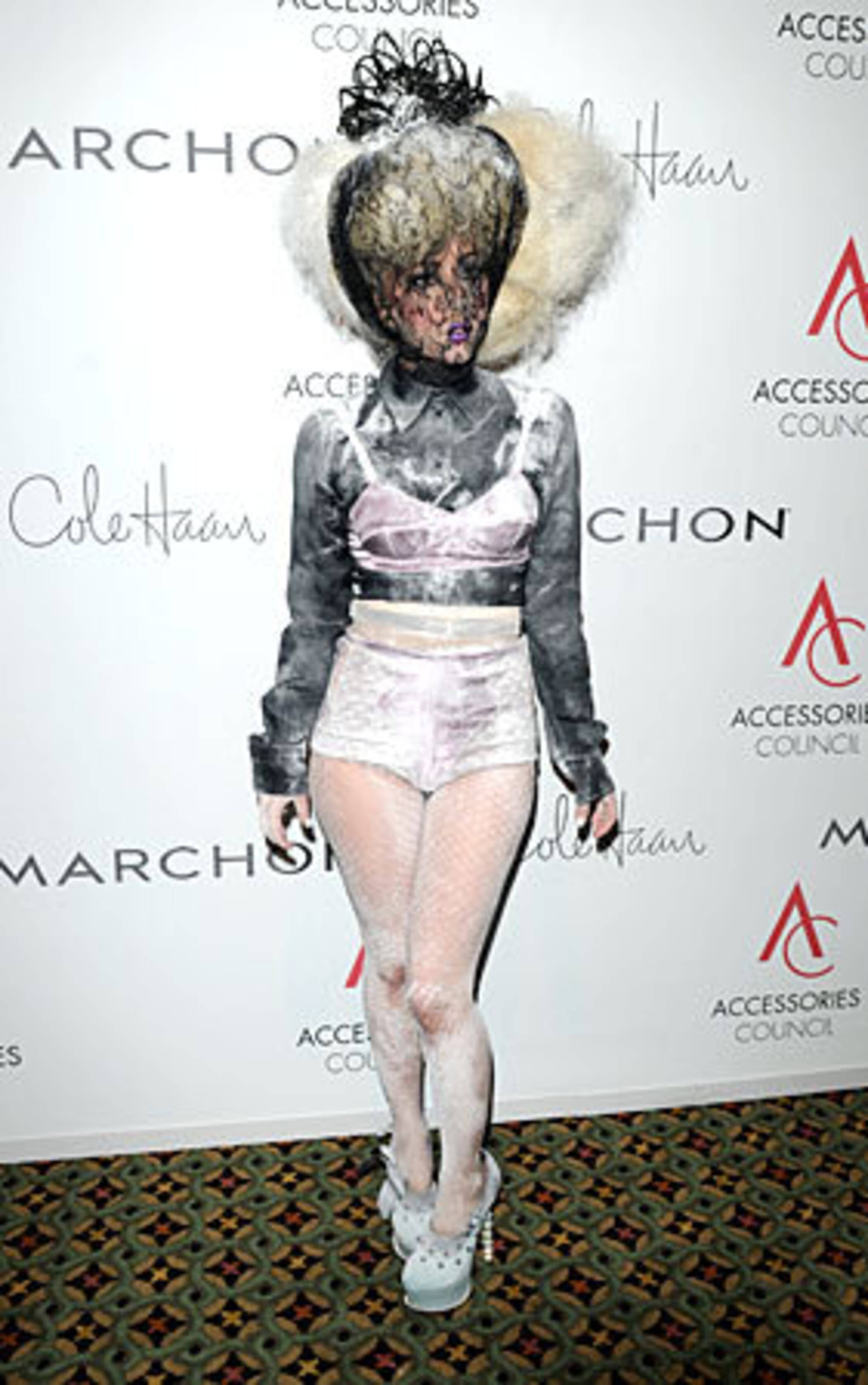 The veiled doll face became a cliche on the fashion runways, but it'll be fresh at your coworker's Halloween party.