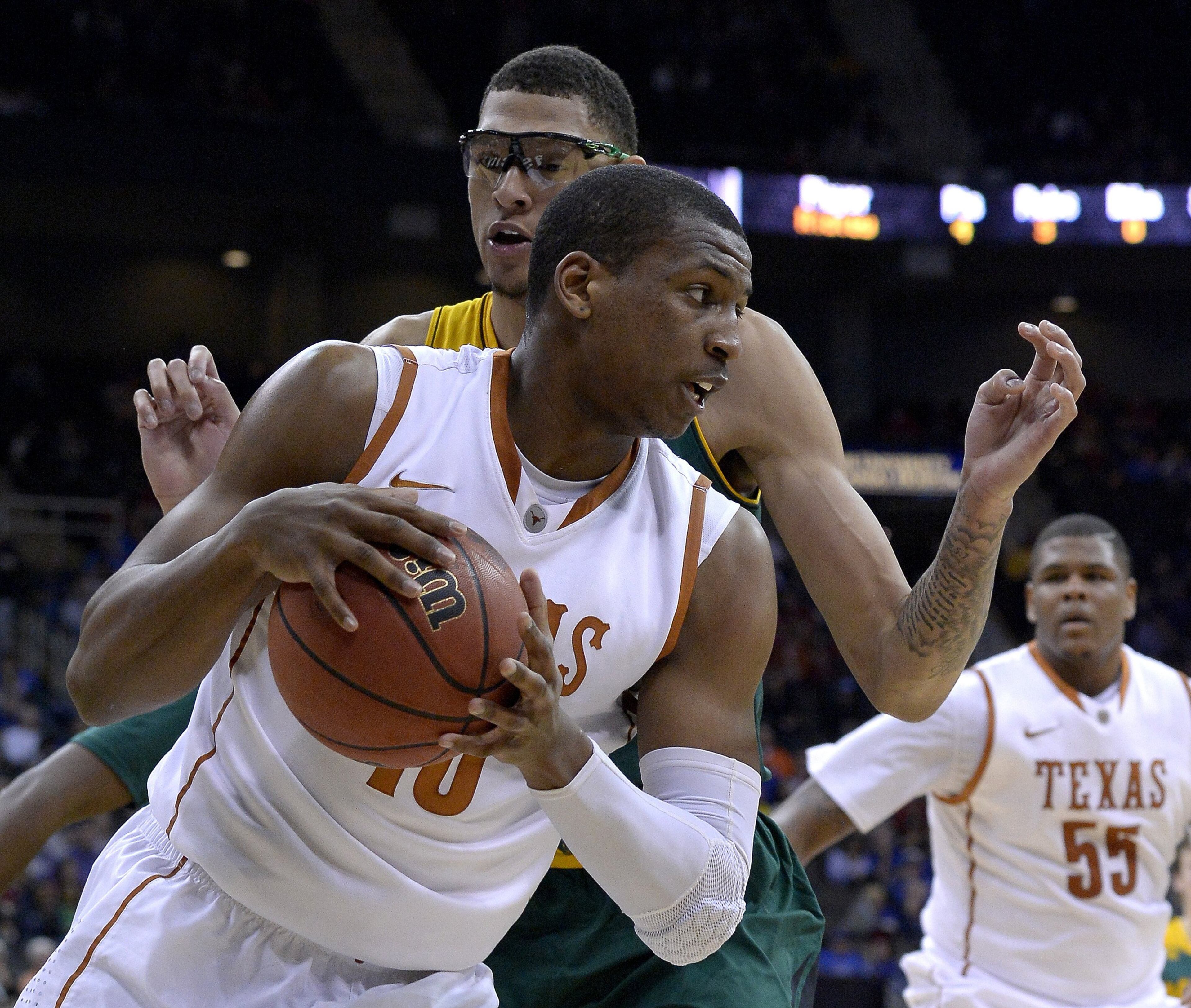 Baylor's Isaiah Austin guards Texas' Jonathan Holmes (10) during the Big 12 Tournament semifinals at the Sprint Center in Kansas City, Mo., on Friday, March 14, 2014.