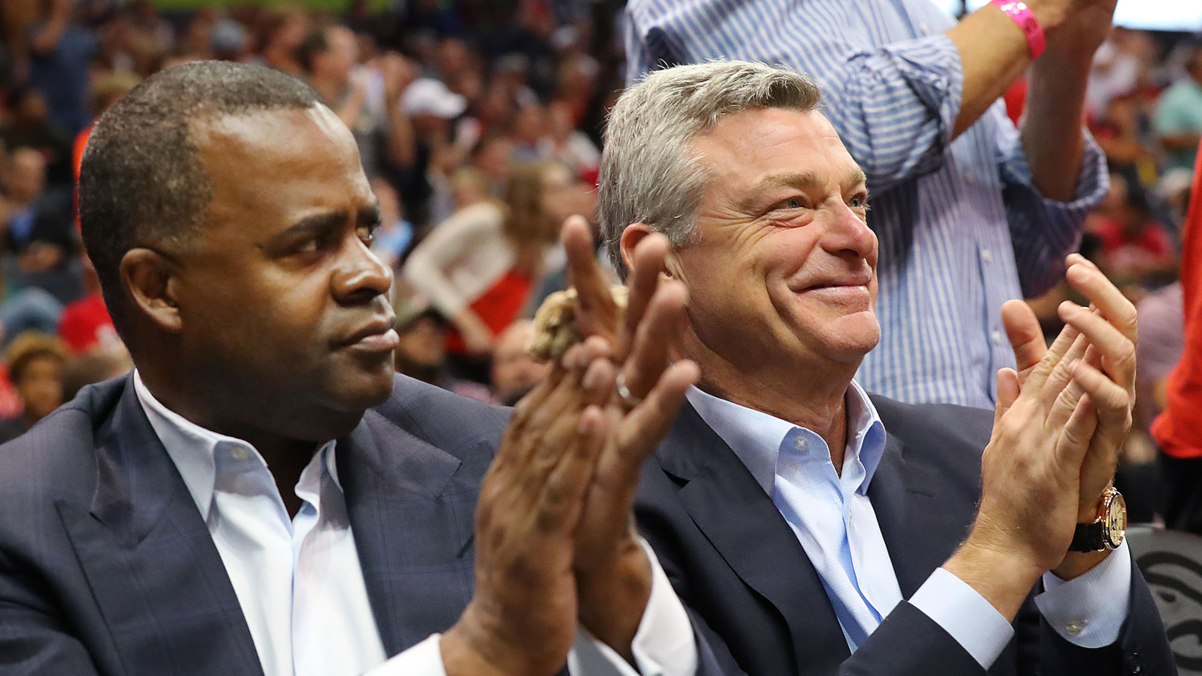 Hawks owner Tony Ressler (right) and Atlanta Mayor Kasim Reed applaude the Hawks during a 111-101 victory over the Washington Wizards in Game 4 of a first-round series on Monday, April 24, 2017, in Atlanta. (Curtis Compton/ccompton@ajc.com)