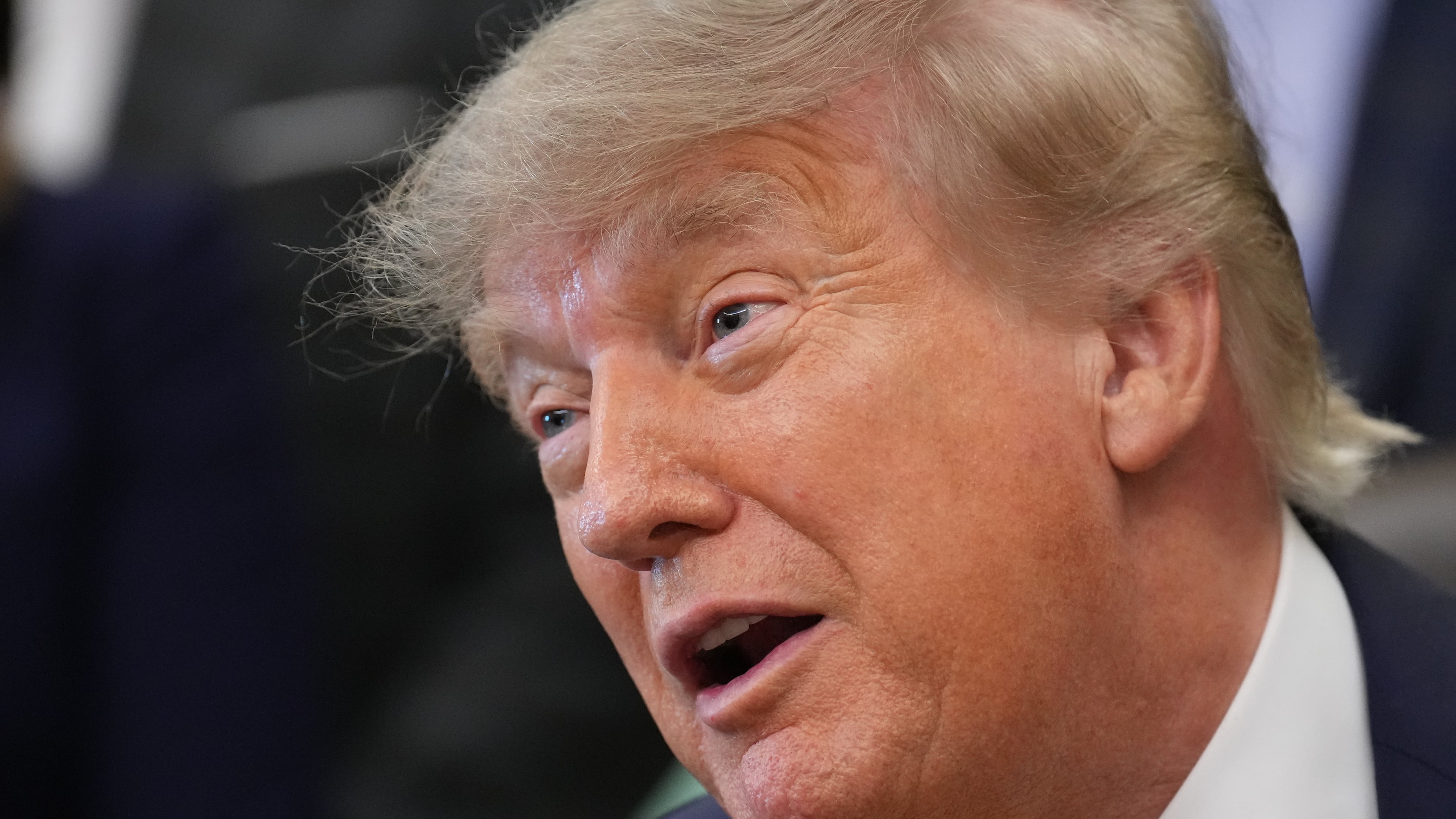 President Donald Trump speaks and announces action to help farmers and ranchers with meat processing, as a group of farmers and ranchers stand behind, Friday, Sept. 4, 2026, in the Oval Office of the White House, in Washington. (AP Photo/Jacquelyn Martin)