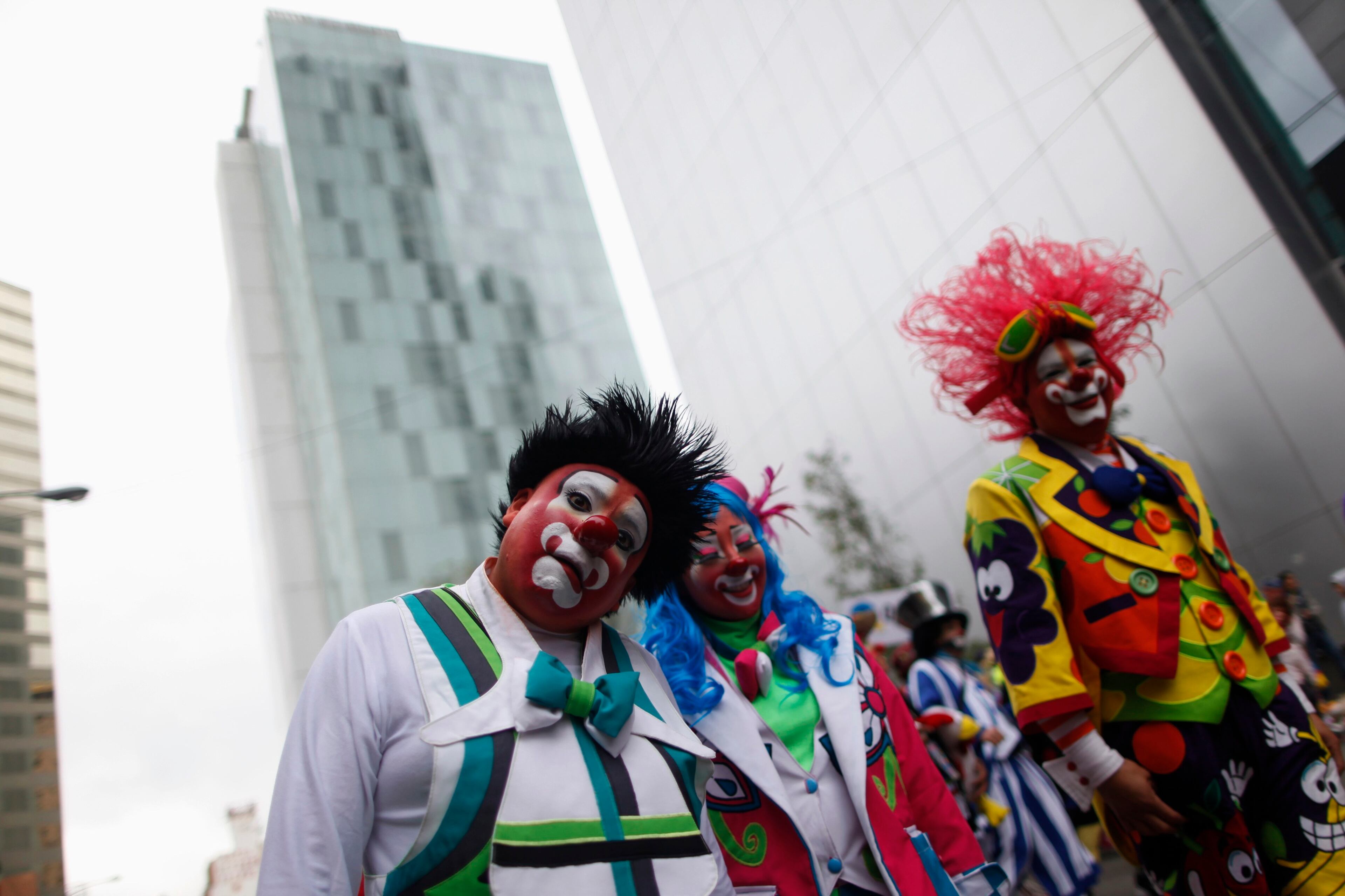 Clowns march as they rally for peace during the 18th Latin American clown convention or "Fair of laughter" at Reforma avenue in Mexico City October 23, 2013.
