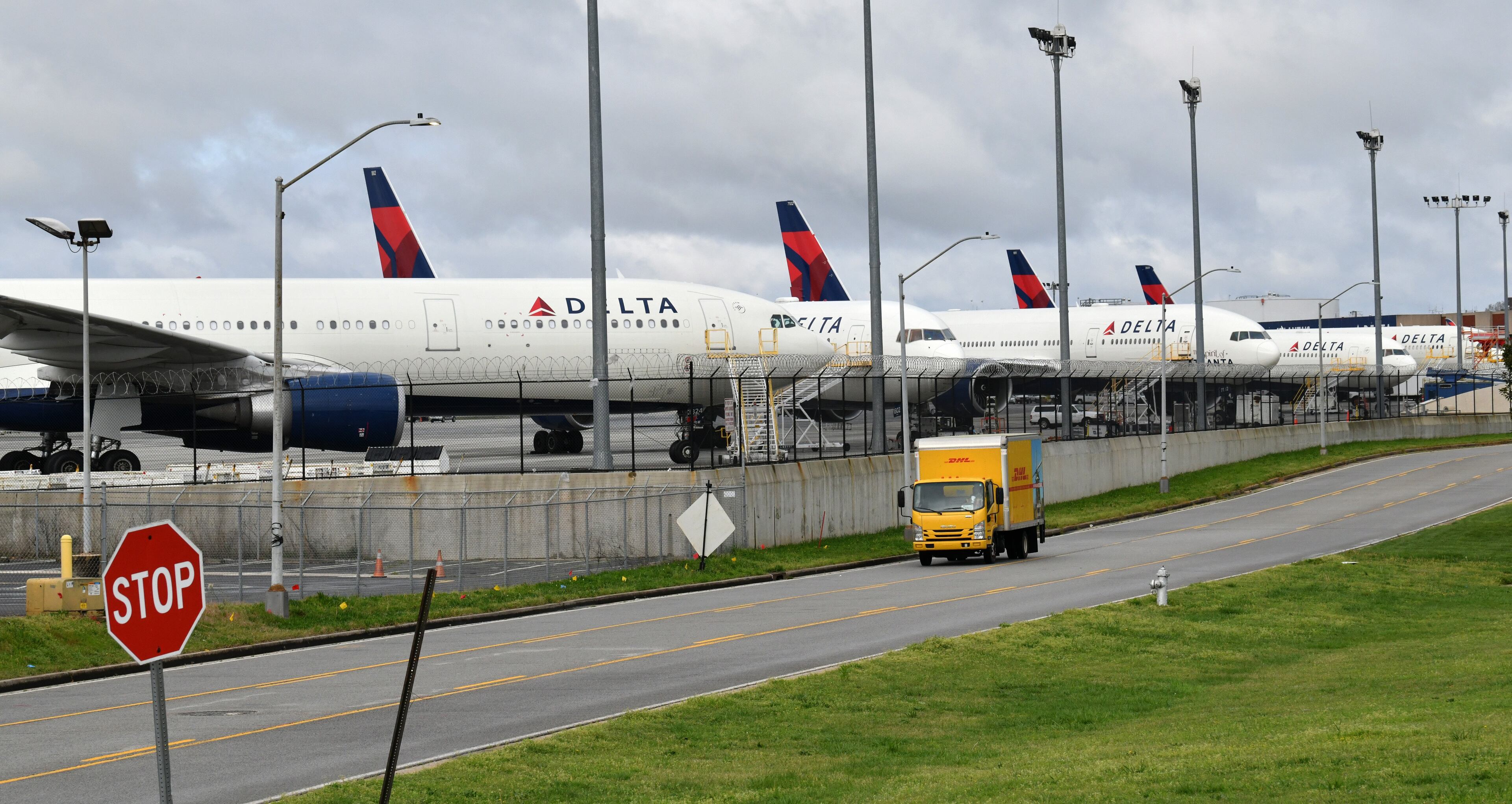 Several Delta Air Lines planes are parked at Hartsfield-Jackson International Airport on Saturday, March 21, 2020. More than 13,000 Delta Air Lines employees have volunteered to take unpaid leave amid industry turmoil caused by the coronavirus pandemic. (Hyosub Shin / Hyosub.Shin@ajc.com)