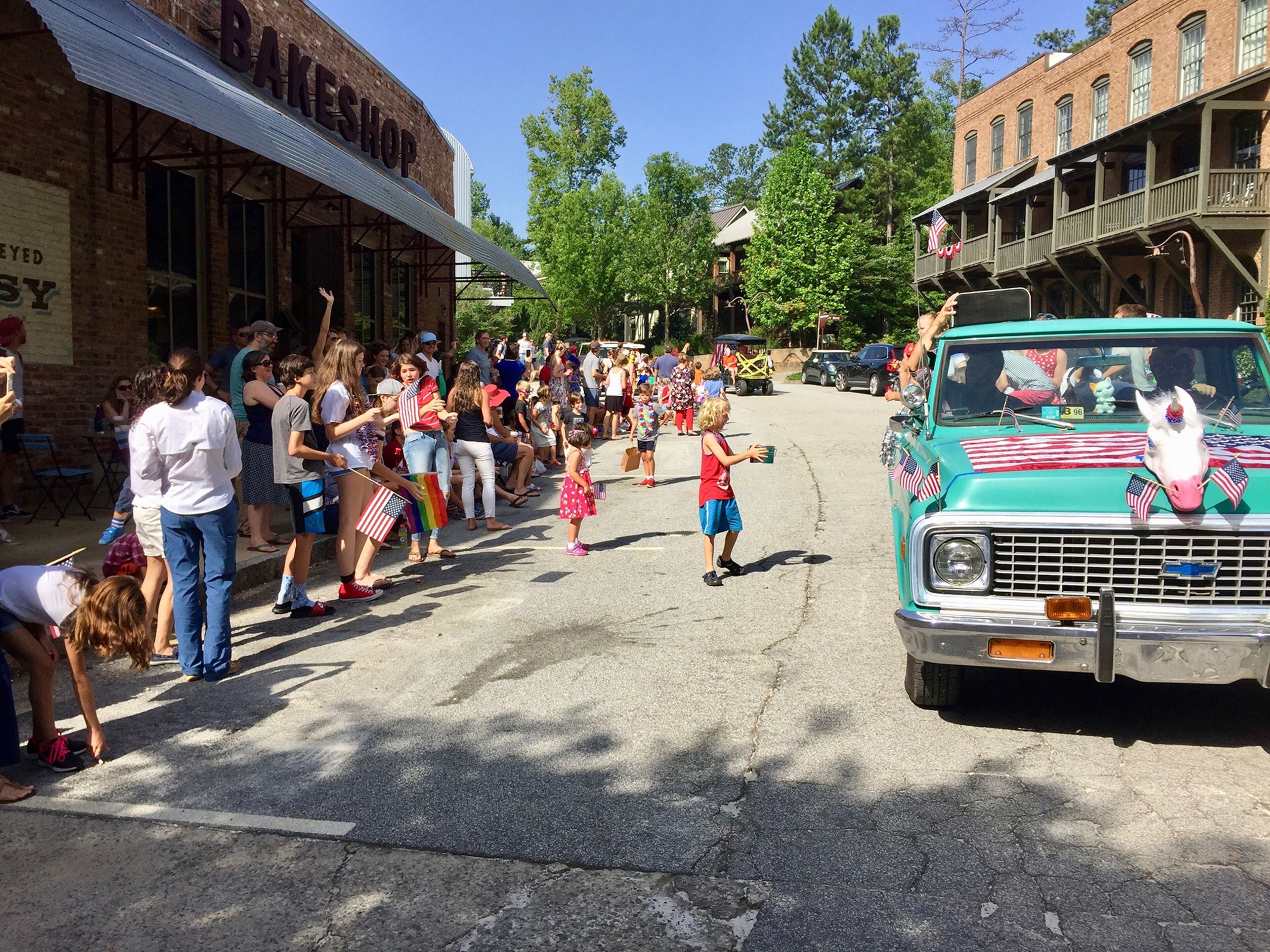 This parade in Serenbe has a small-town feel with decorated floats, walking musicians and the city fire truck. (Courtesy of Serenbe)