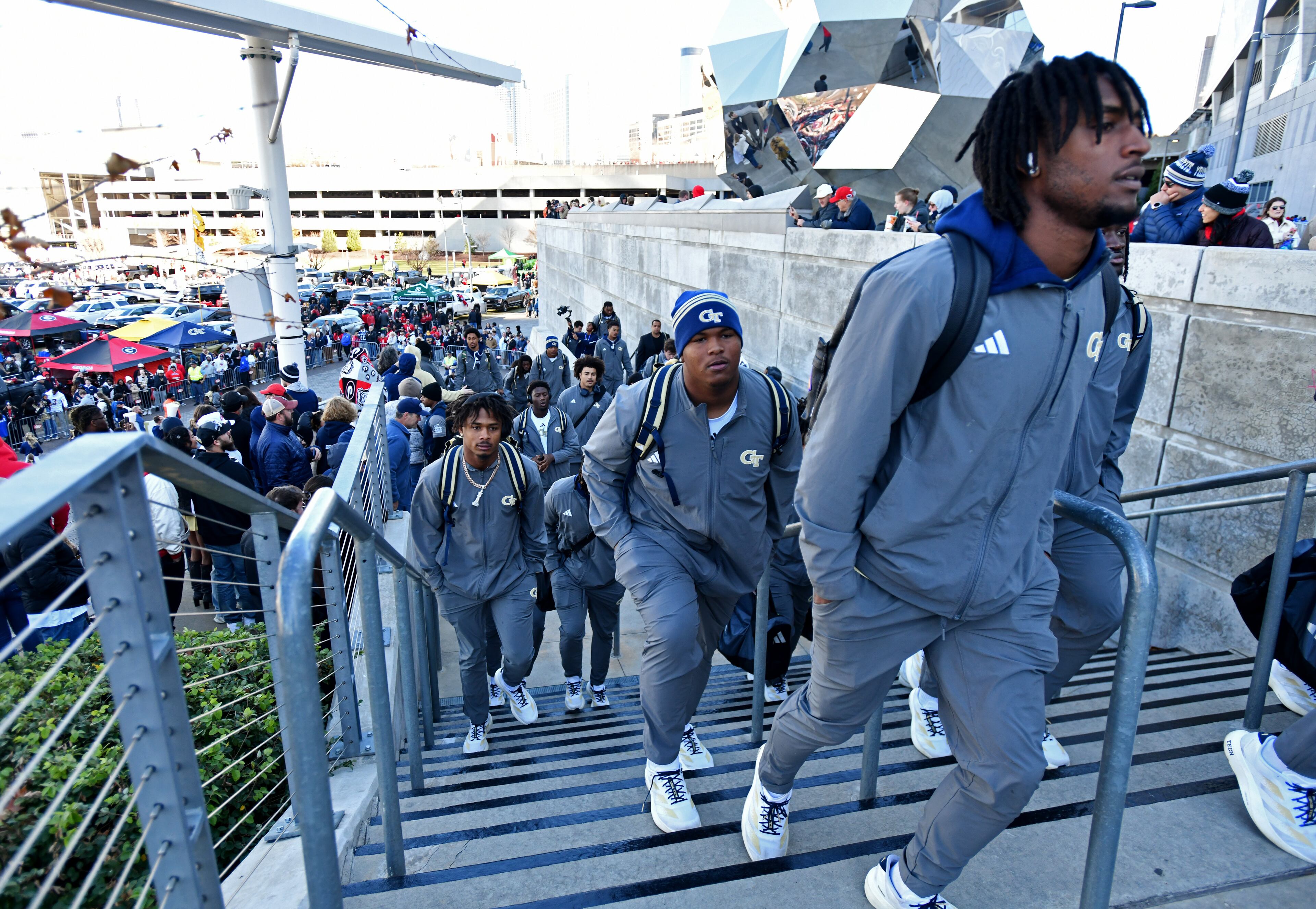 Georgia Tech players and coaching staff arrive before the start of the Georgia Tech vs Georgia football game at Mercedes-Benz Stadium, Friday, Nov. 28, 2025 in Atlanta. (Hyosub Shin/AJC)