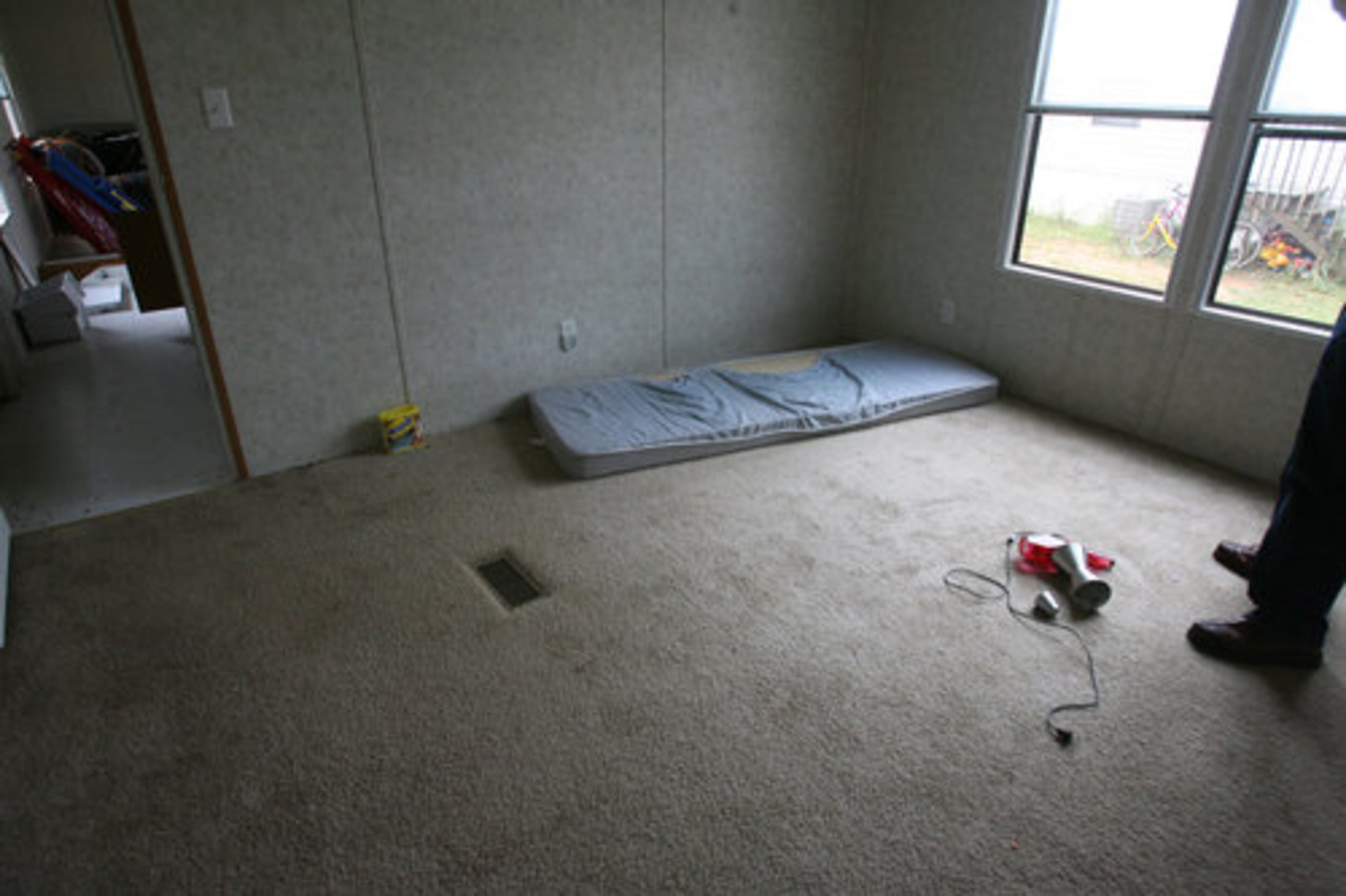 Police searched for evidence in the trailer Wednesday after arresting Raymond Daniel Thurmond a day earlier on charges of rape, child abuse and false imprisonment, said Bruce Carlisle, Lavonia's police chief.