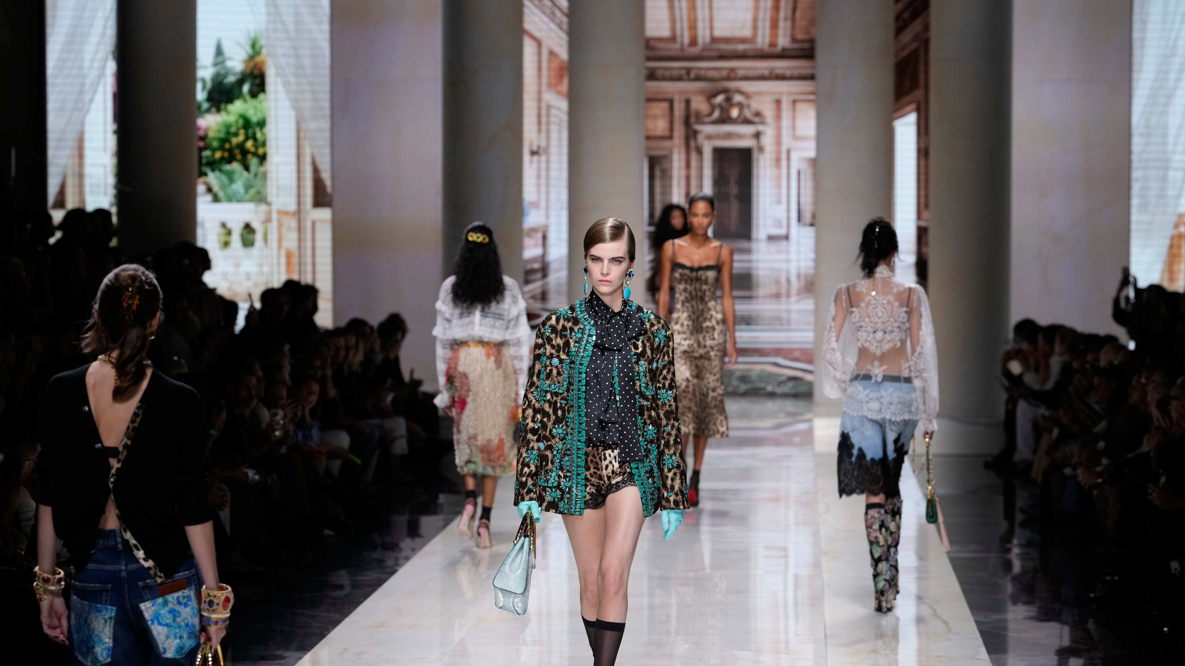 A model wears a creation part of Dolce & Gabbana women's Spring-Summer 2027 collection, presented in Milan, Italy, Saturday, Sept. 26, 2026. (AP Photo/Luca Bruno)