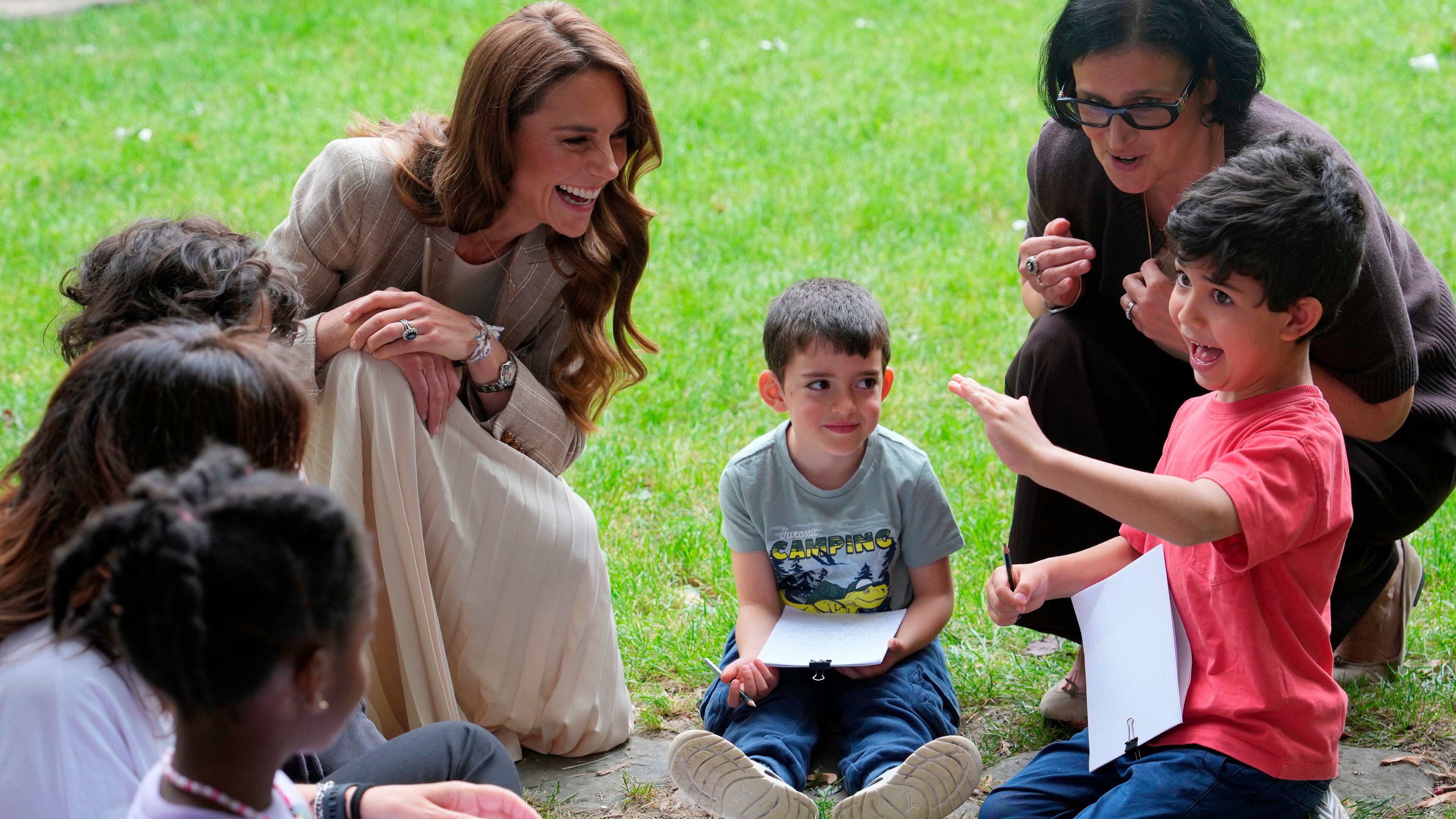Britain's Kate, Princess of Wales visits the Salvador Allende preschool to observe how nature-based learning is embedded within the Reggio Emilia approach, part of a two-day trip, in Reggio Emilia, Italy, Thursday, May 14, 2026. (AP Photo/Antonio Calanni, Pool)