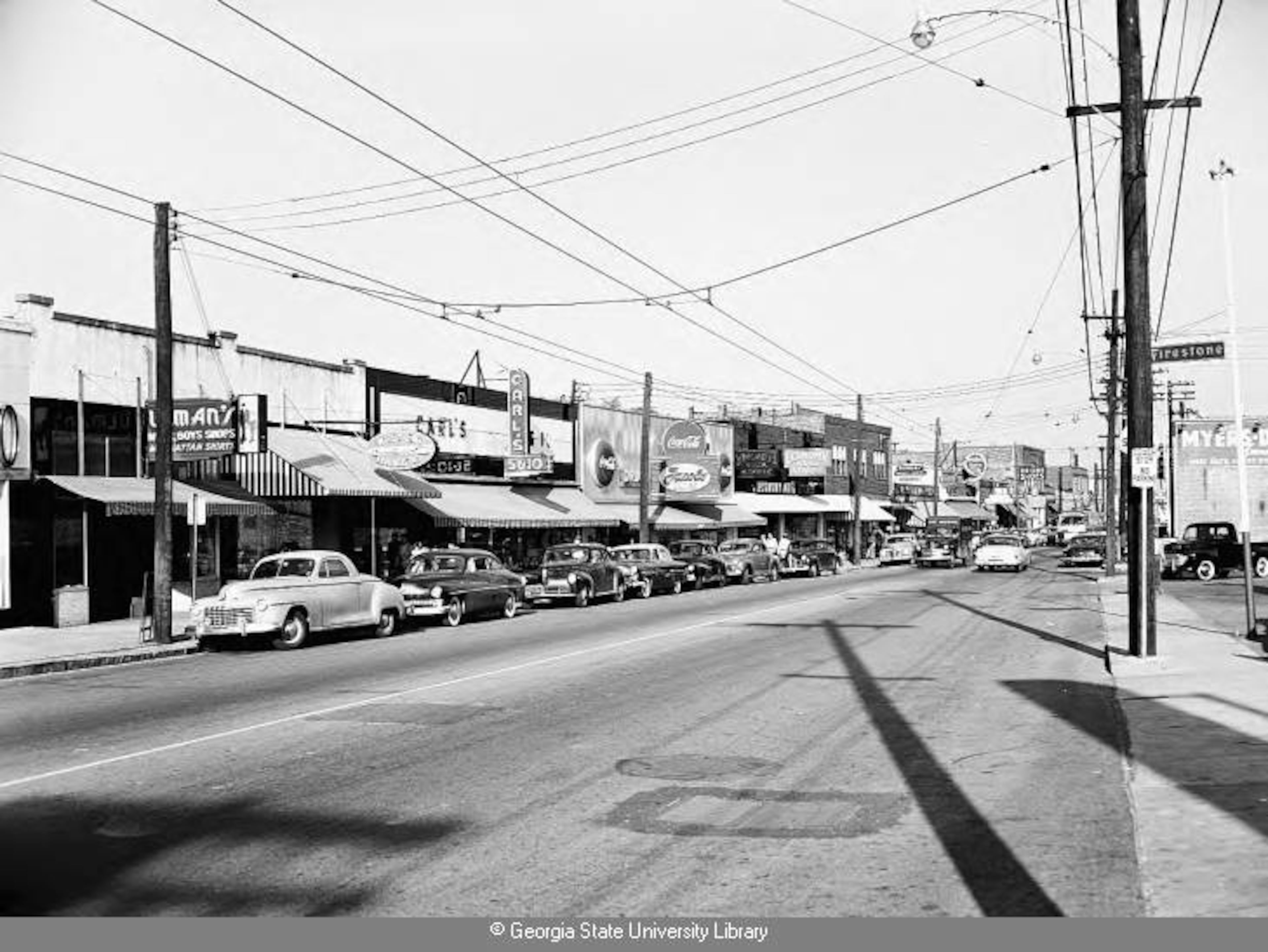 1940s -- Various businesses line the area of Gordon and Evans Streets. LANE BROS. PHOTOGRAPHIC COLLECTION / GSU
