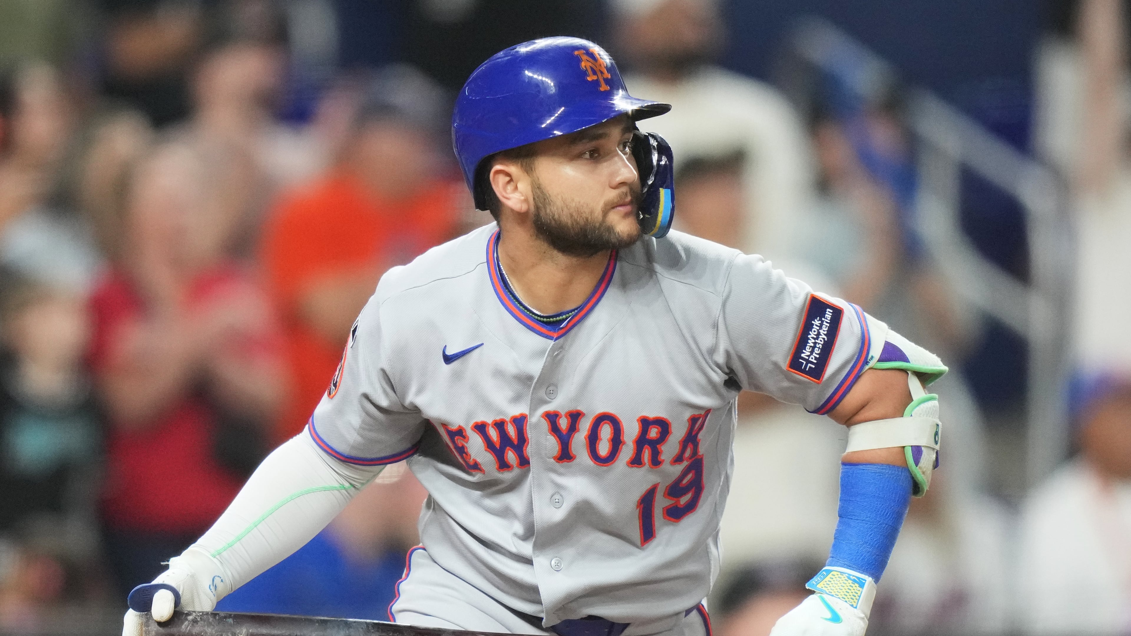 New York Mets' Bo Bichette watches as he flies out to center field during the ninth inning of a baseball game against the Miami Marlins, Friday, May 22, 2026, in Miami. (AP Photo/Lynne Sladky)
