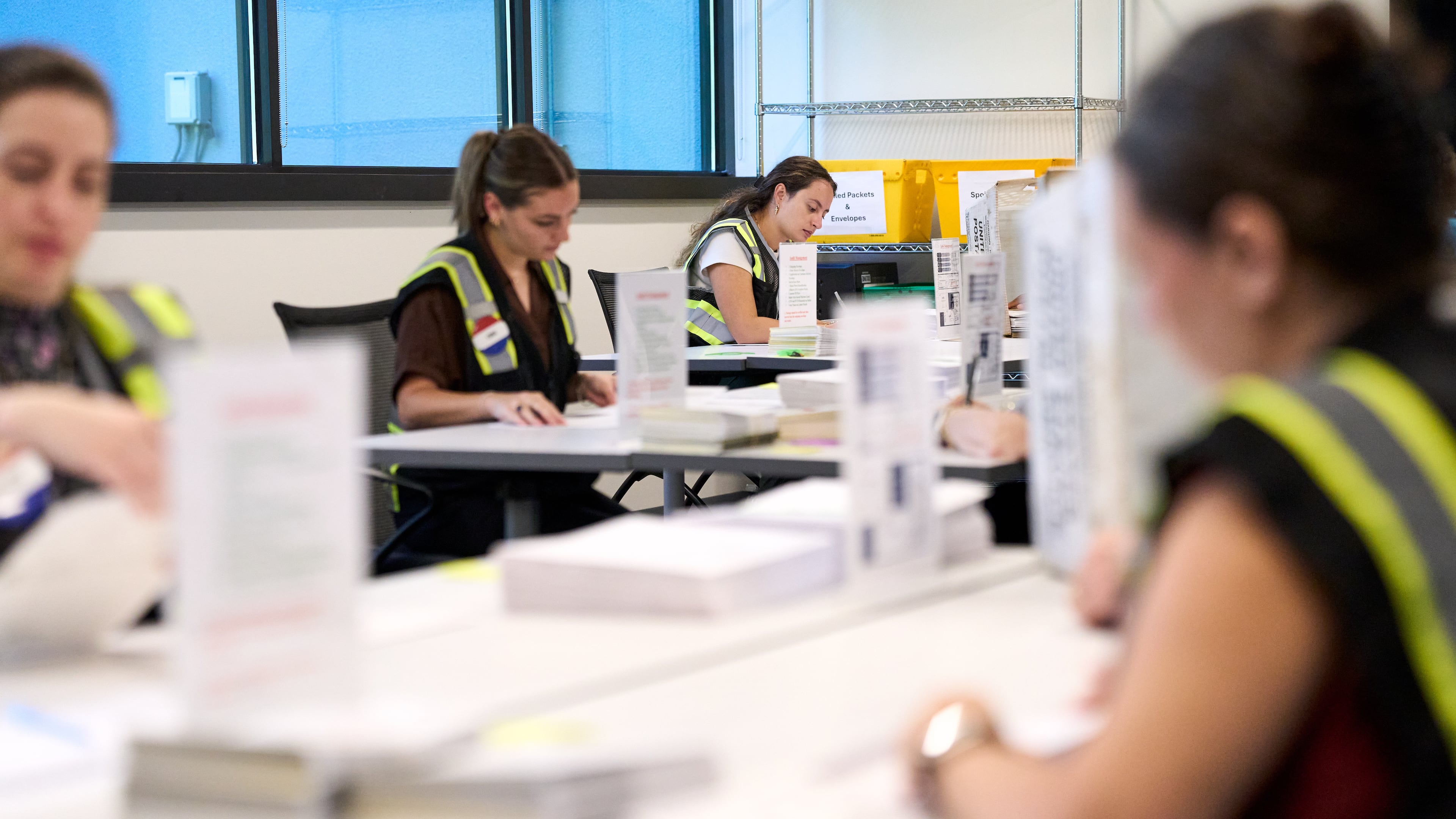 Wake County Board of Elections employees prepare absentee ballots to be mailed on Thursday, Sept. 3, 2026, in Raleigh, N.C. (AP Photo/Matt Ramey)