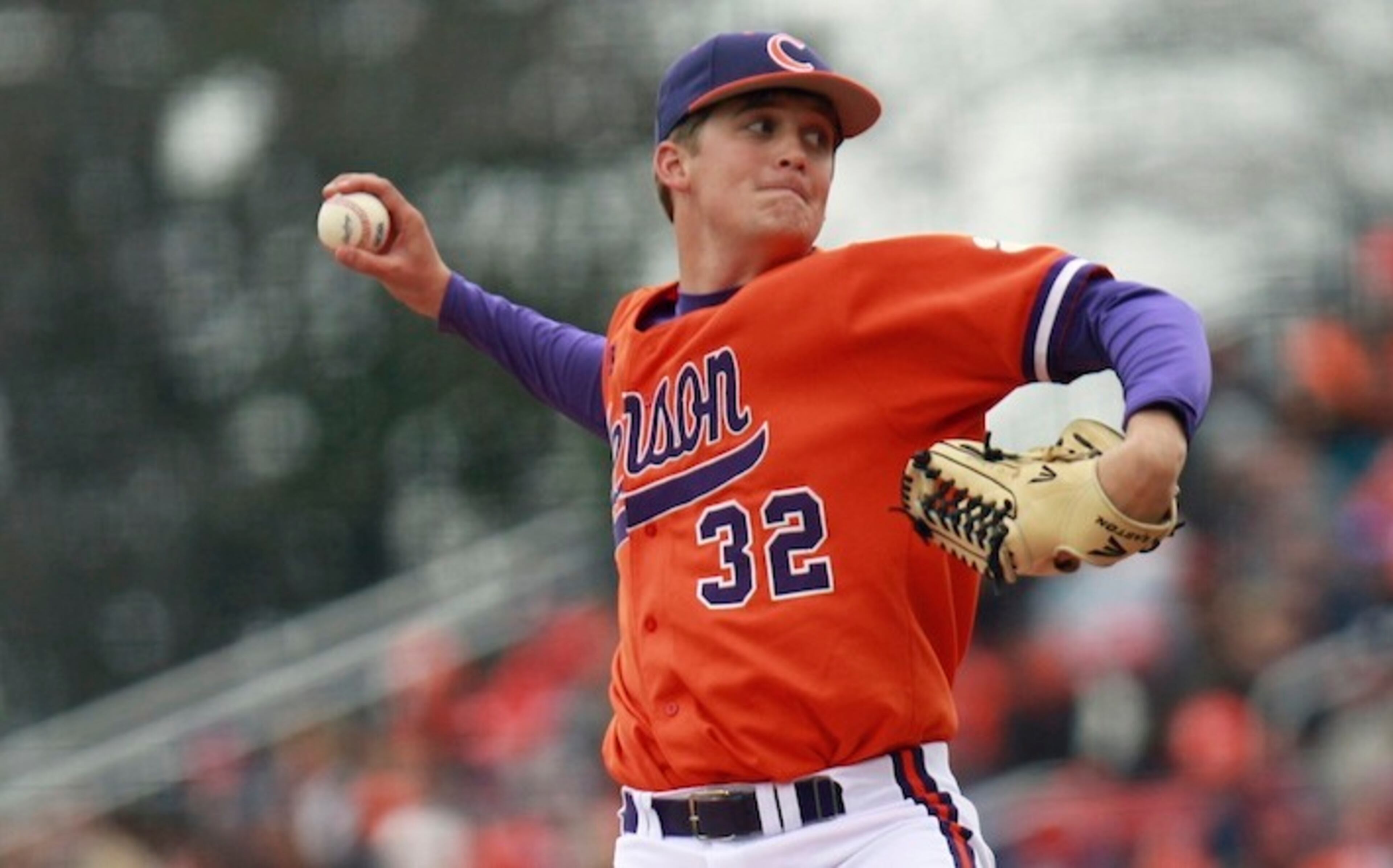 FILE - In this March 2, 2013 filephoto, Clemson's Clate Schmidt throws a pitch against South Carolina during an NCAA college baseball game at Fluor Field in Greenville, S.C. Schmidt threw 77 pitches in a win over Maine on Saturday, Feb. 19, 2016, six months after his cancer went into remission. (Mark Crammer /The Independent-Mail via AP, File) THE GREENVILLE NEWS OUT, SENECA NEWS OUT; MANDATORY CREDIT