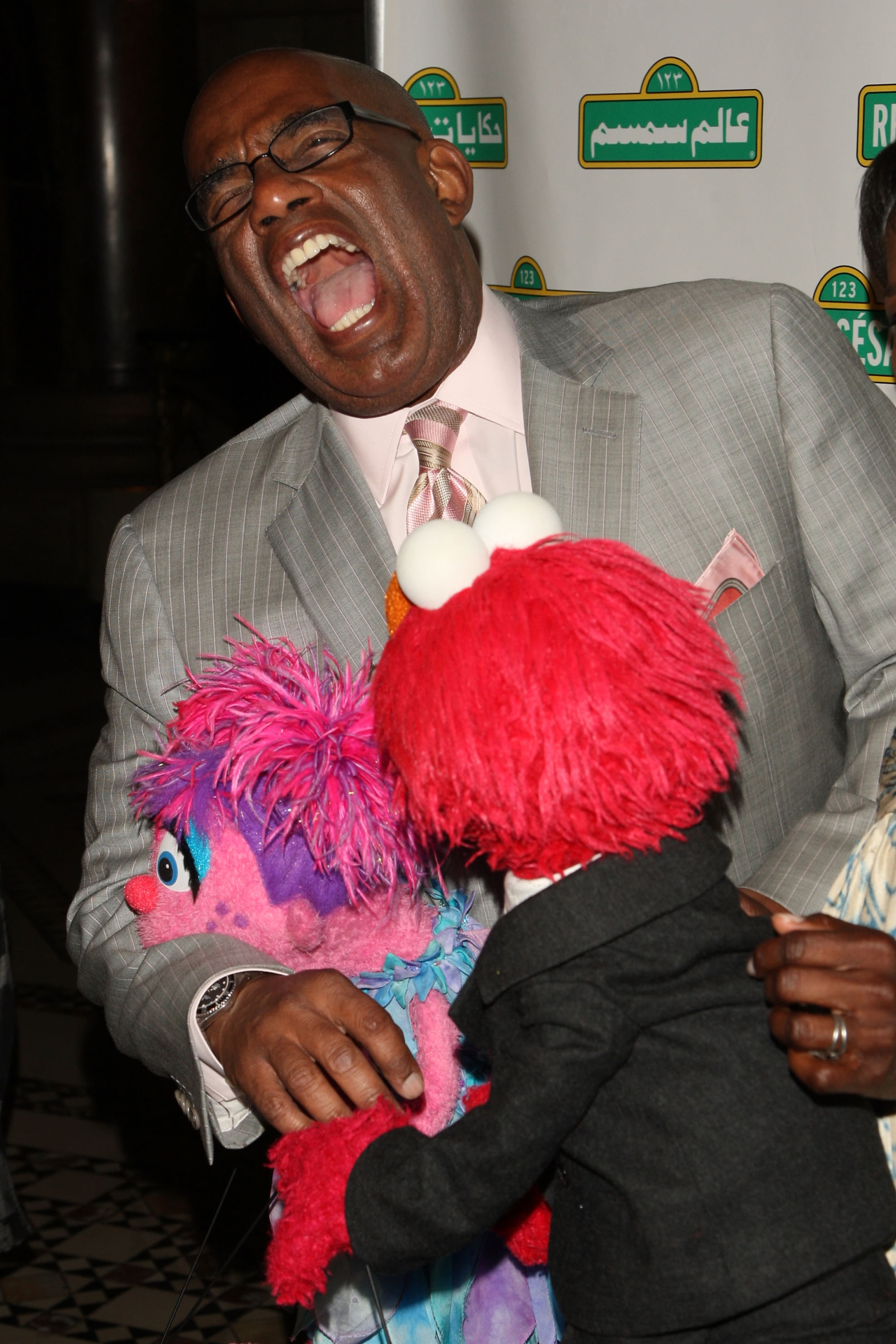 NEW YORK - MAY 27: Co-host of NBC's Today show Al Roker poses with Sesame Street Muppets at the 7th annual gala benefiting Sesame Workshop at Cipriani 42nd Street on May 27, 2009 in New York City. (Photo by Bryan Bedder/Getty Images)