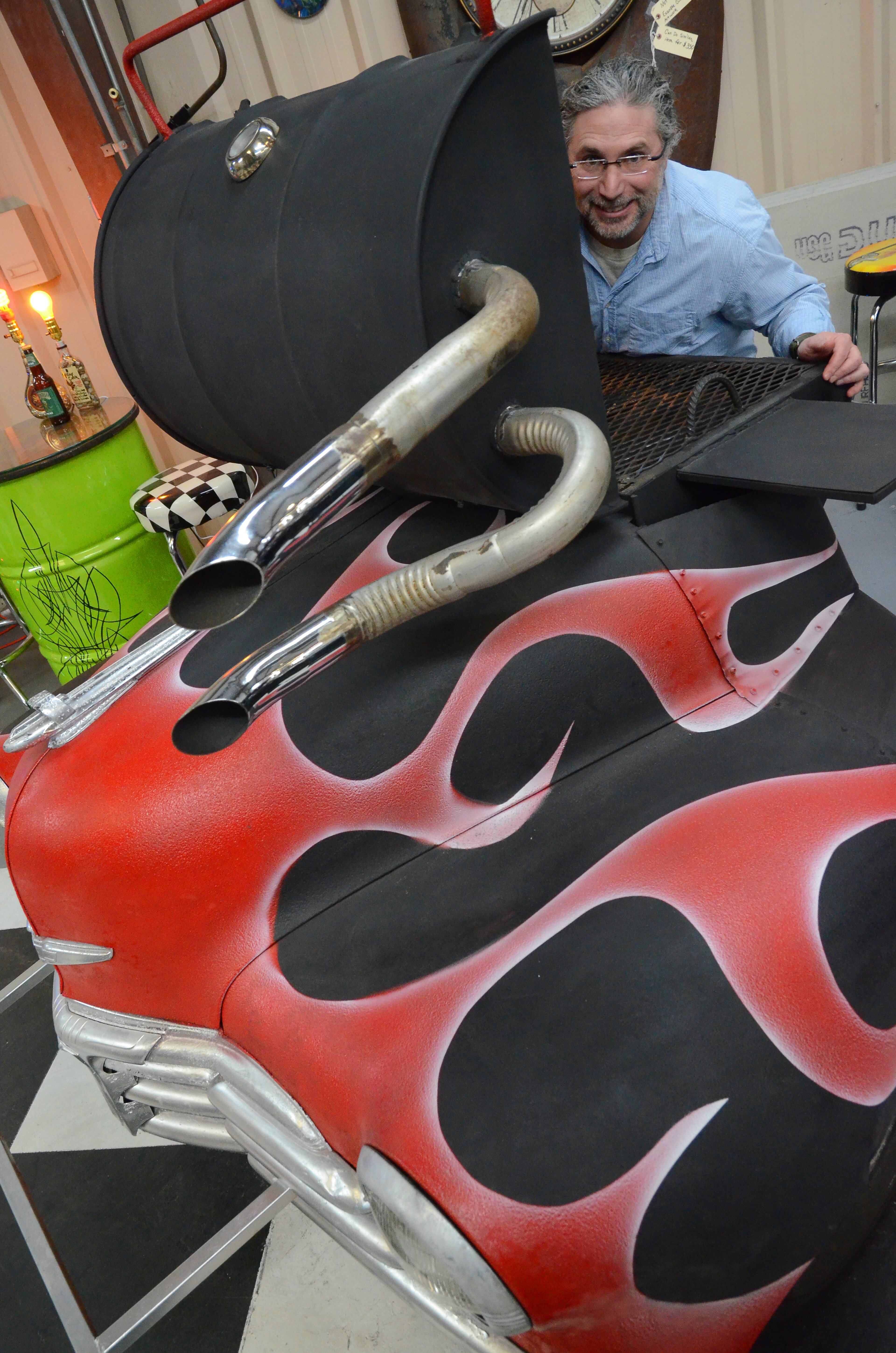 Bernstein shows off a 1947 Chevy grill.