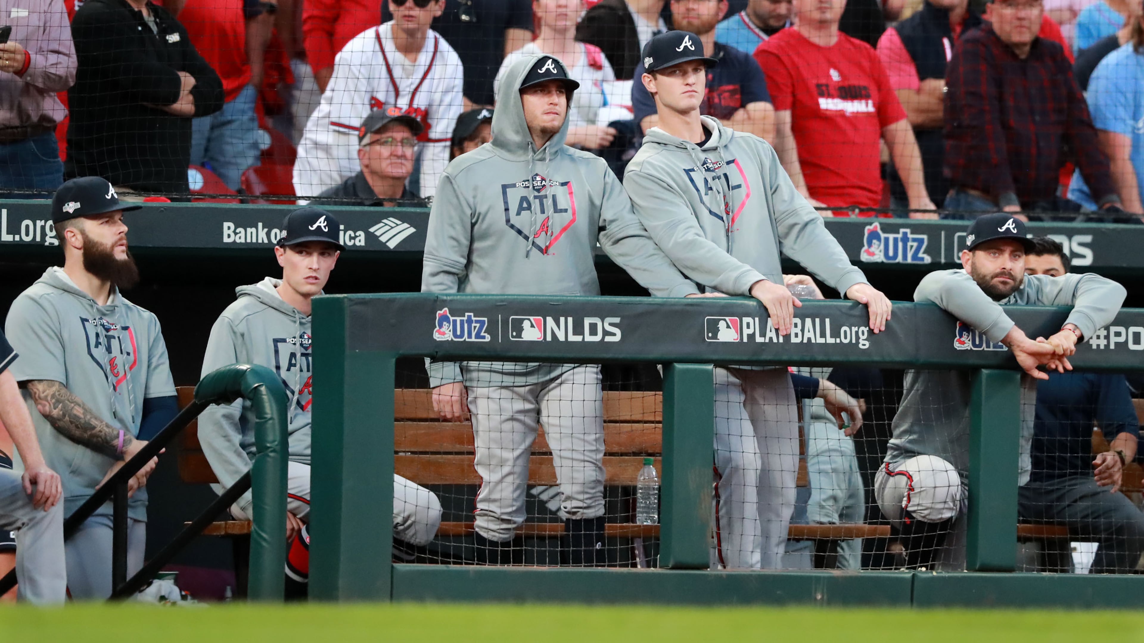 Dallas Keuchel (far left), Mike Fried and Mike Soroka are among the Braves players watching from the dugout in the waning moments of Monday's Game 4 loss to the Cardinals in the National League Division Series.