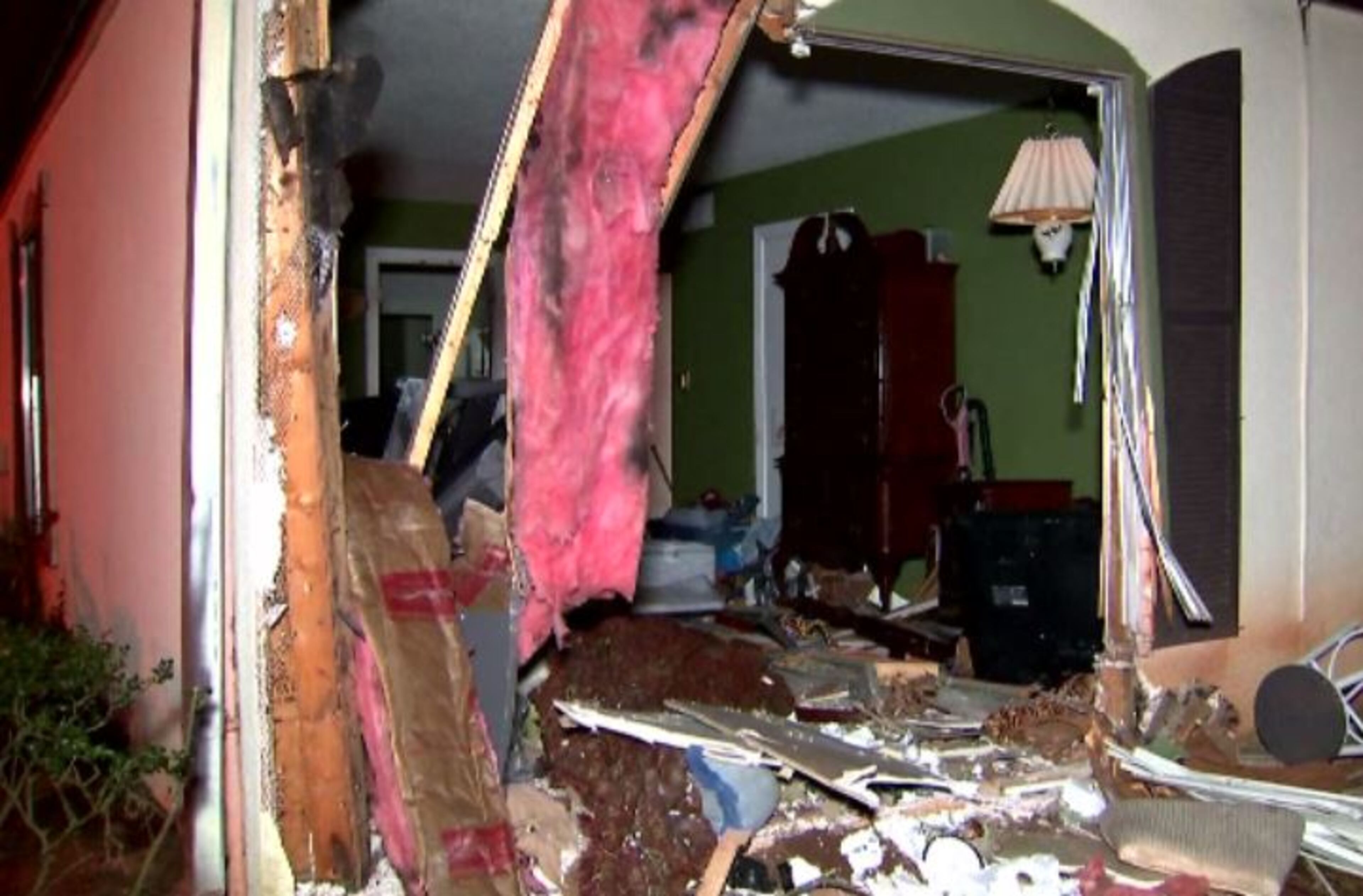The SUV crashed into a woman’s DeKalb County condominium Thursday night.