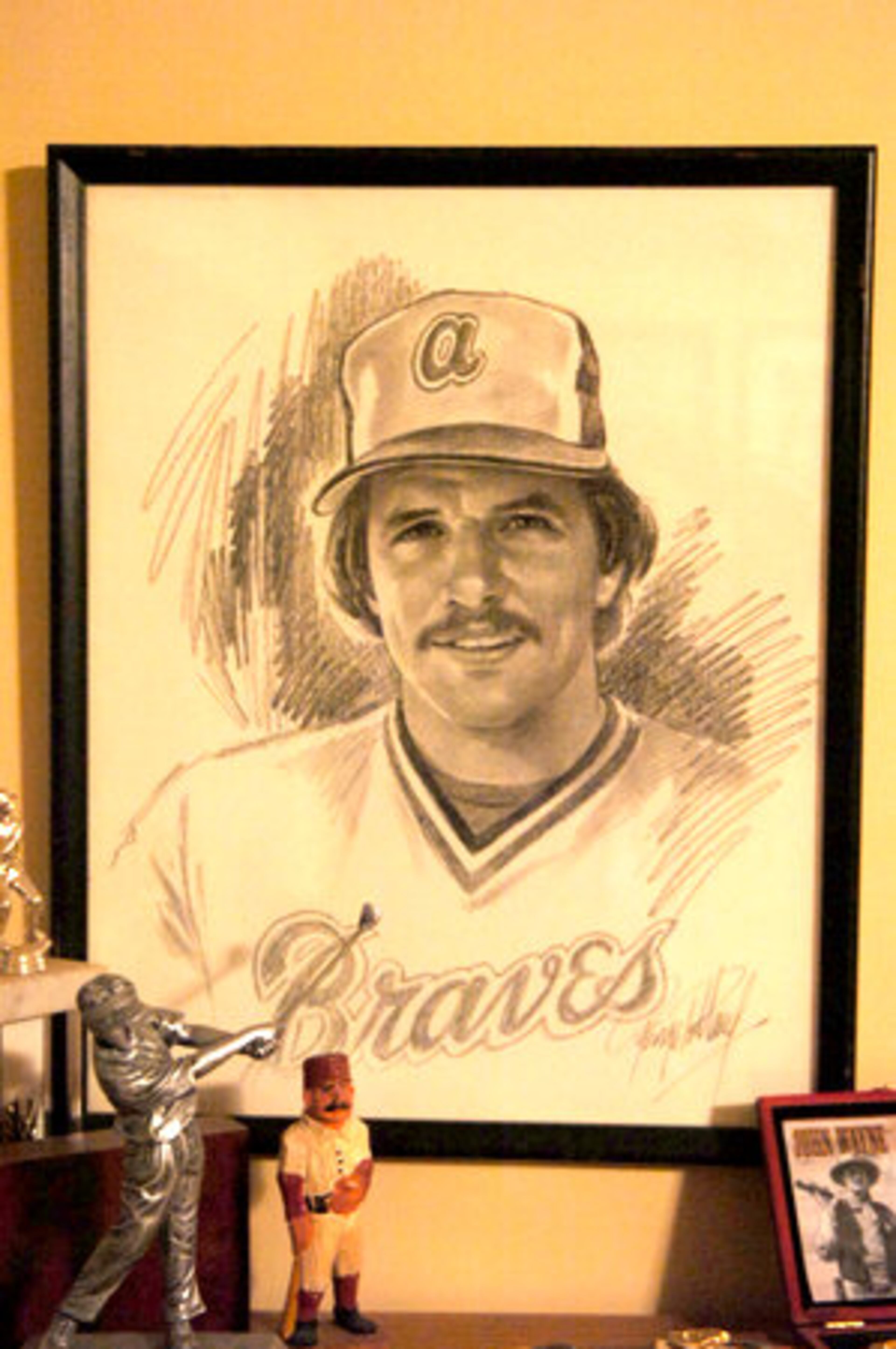 At 55, former Braves pitcher Rick Camp is starting over. Camp was released from federal prison late last year. A drawing of him adorns his home in White.