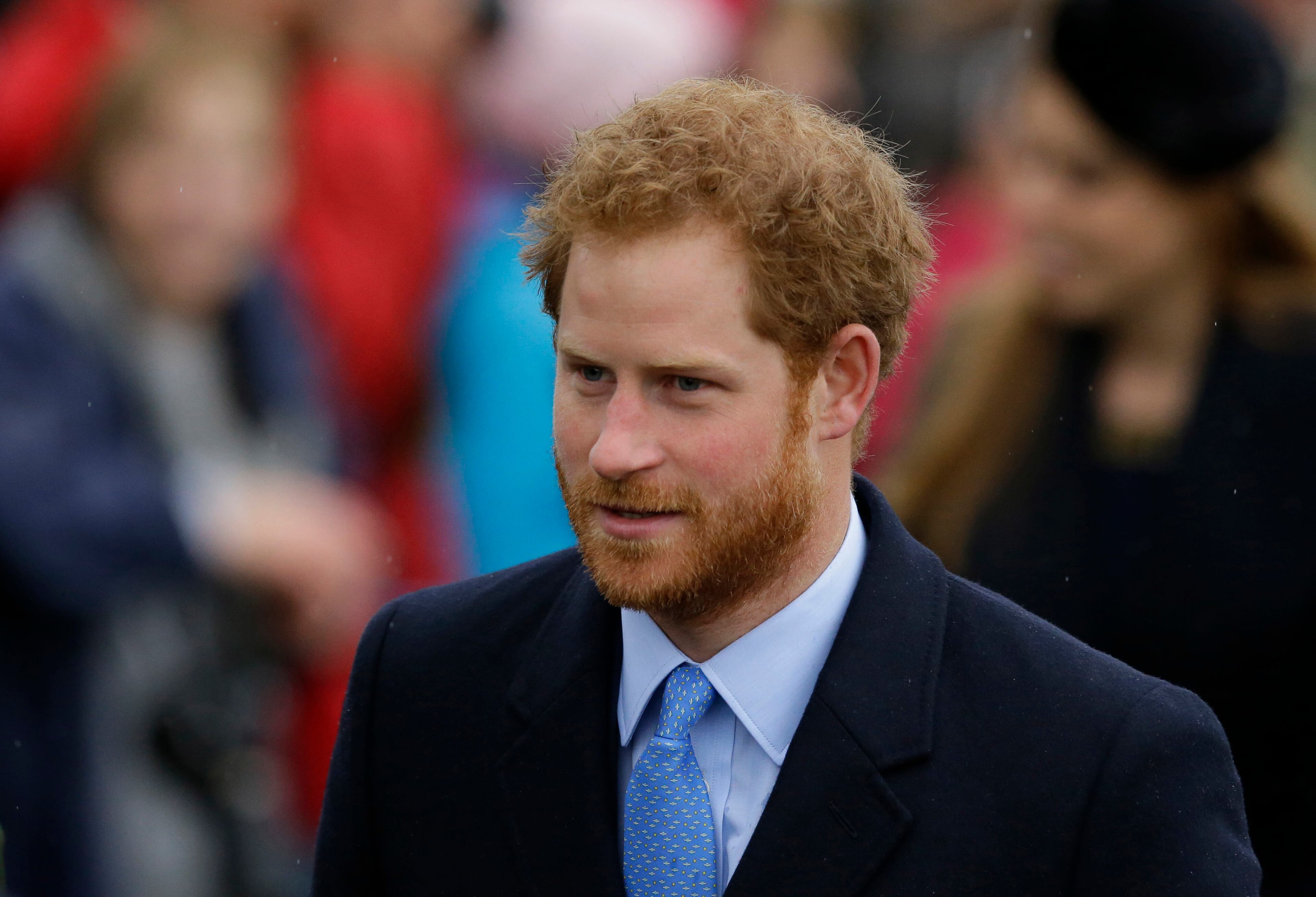 Britain's Prince Harry arrives with family members to attend the traditional Christmas Day church service, at St. Mary Magdalene Church in Sandringham, England, Friday, Dec. 25, 2015. (AP Photo/Matt Dunham)