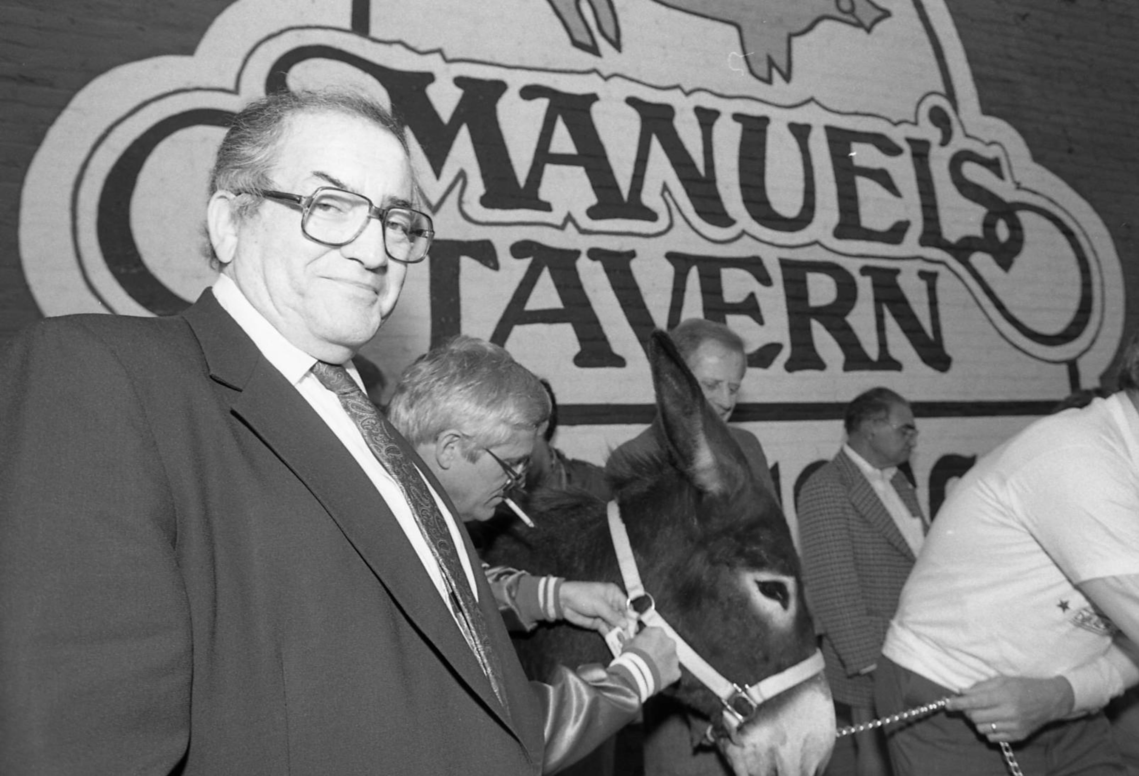 Democrat Manuel Maloof with donkey, outside Manuel's Tavern, part of Maloof's re-election campaign for CEO of DeKalb County, Atlanta, Georgia, October, 1987. Louie Favorite/ Atlanta Journal-Constitution staff
