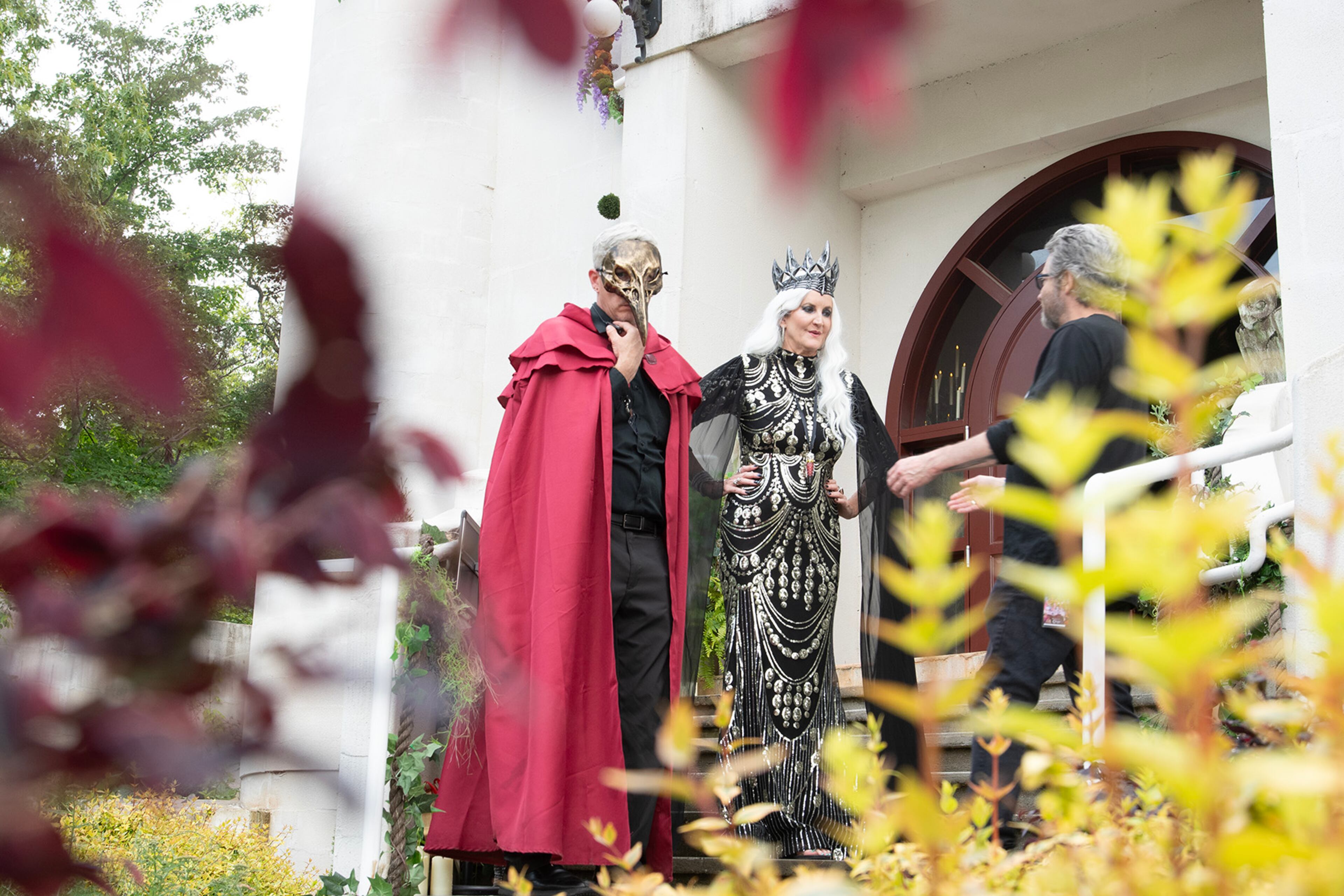 In total, there are 27 core performers and 15 guardians who wear red capes with cloaks and masks and use voice modulators during the “Mirth and Mischief” immersive experience. (Courtesy)