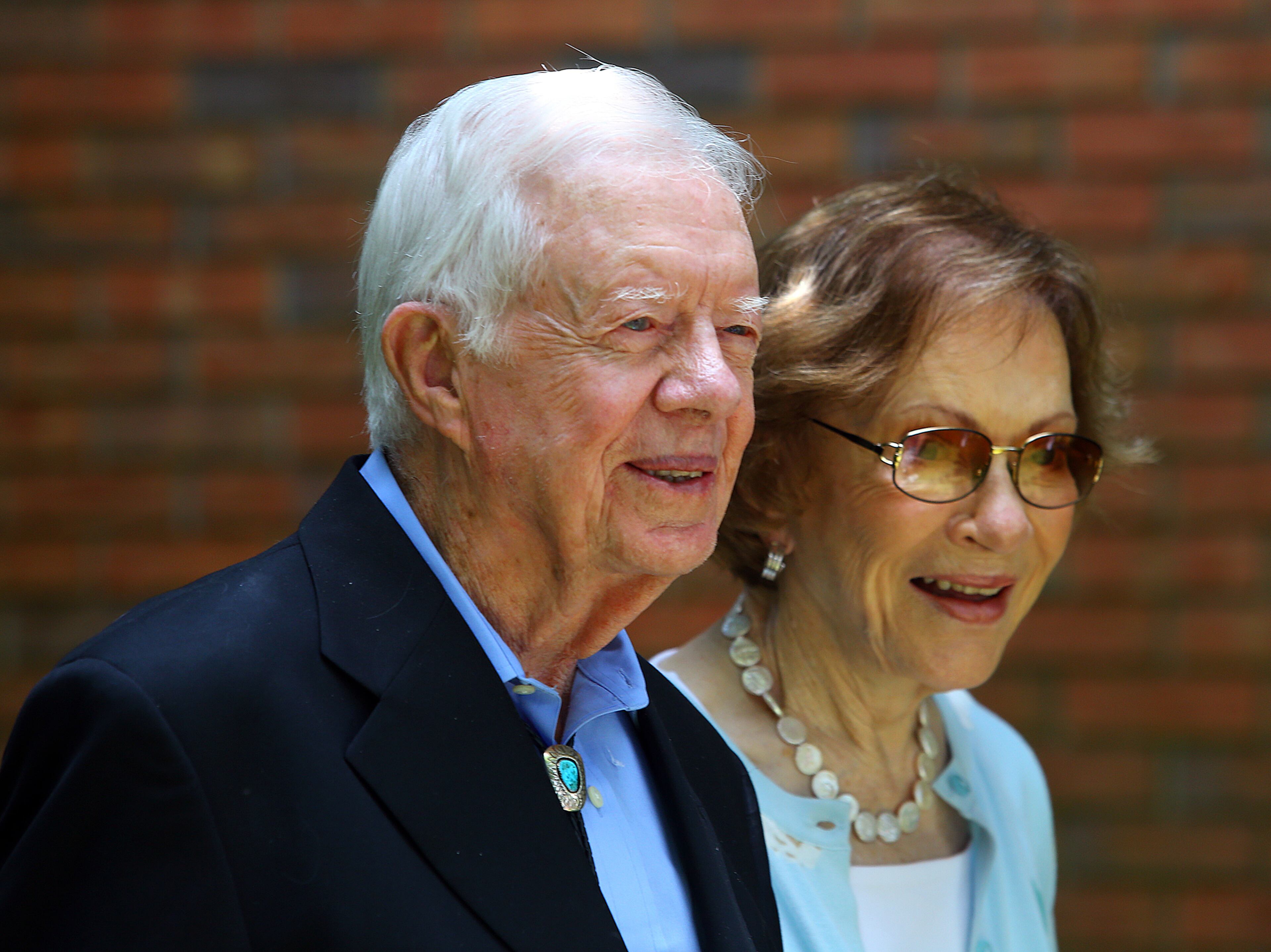 Jimmy & Rosalynn Carter graciously remain outside the Maranatha Baptist Church, where they attend, to have their pictures made with any visitors wishing to do so following the worship service on Sunday, June 15, 2014, in Plains. CURTIS COMPTON / CCOMPTON@AJC.COM