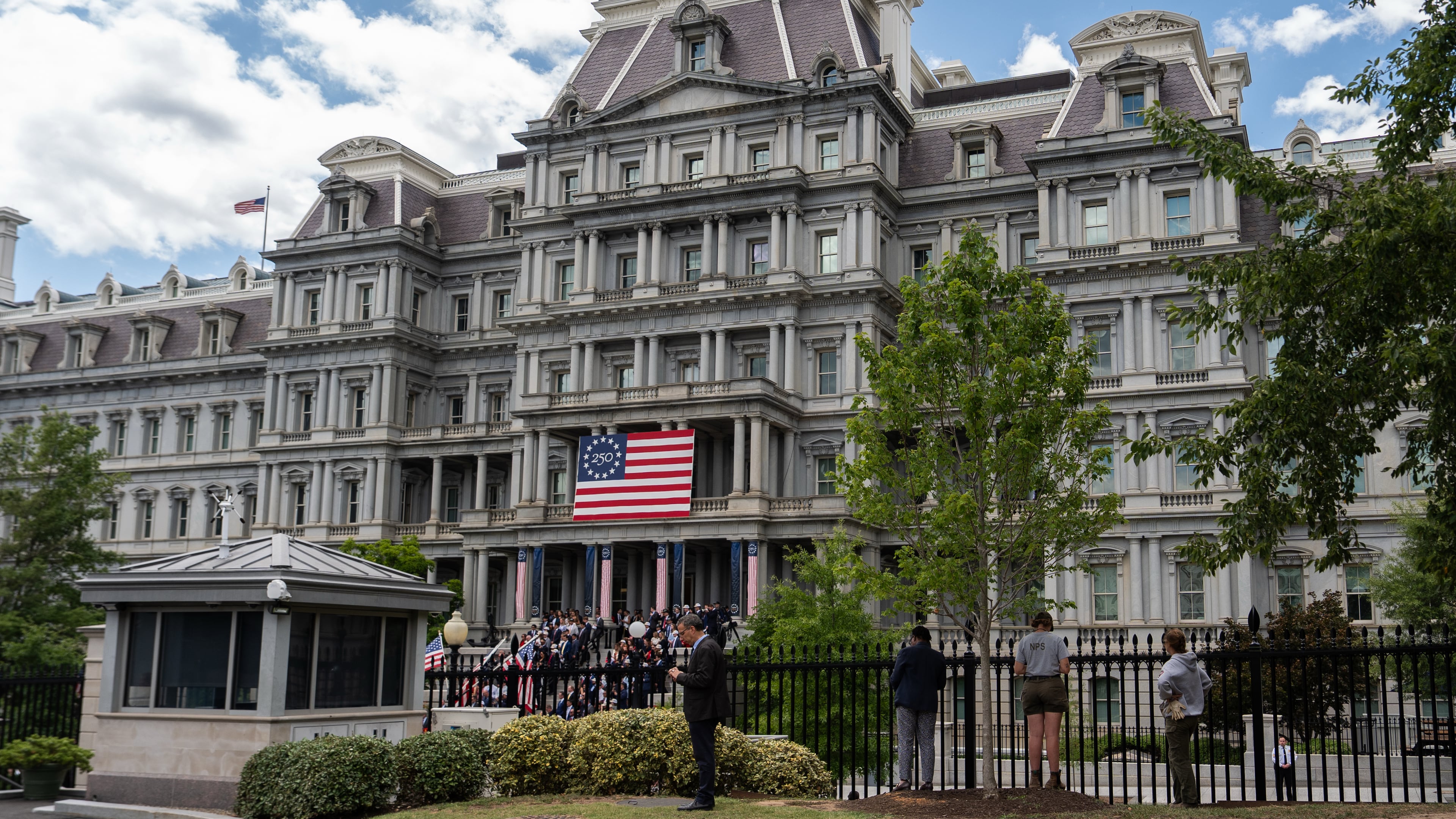 The Eisenhower Executive Office Building is seen as President Donald Trump speaks during an event to announce the Freedom Haulers initiative at the White House, Thursday, July 30, 2026, in Washington. (AP Photo/Julia Demaree Nikhinson)