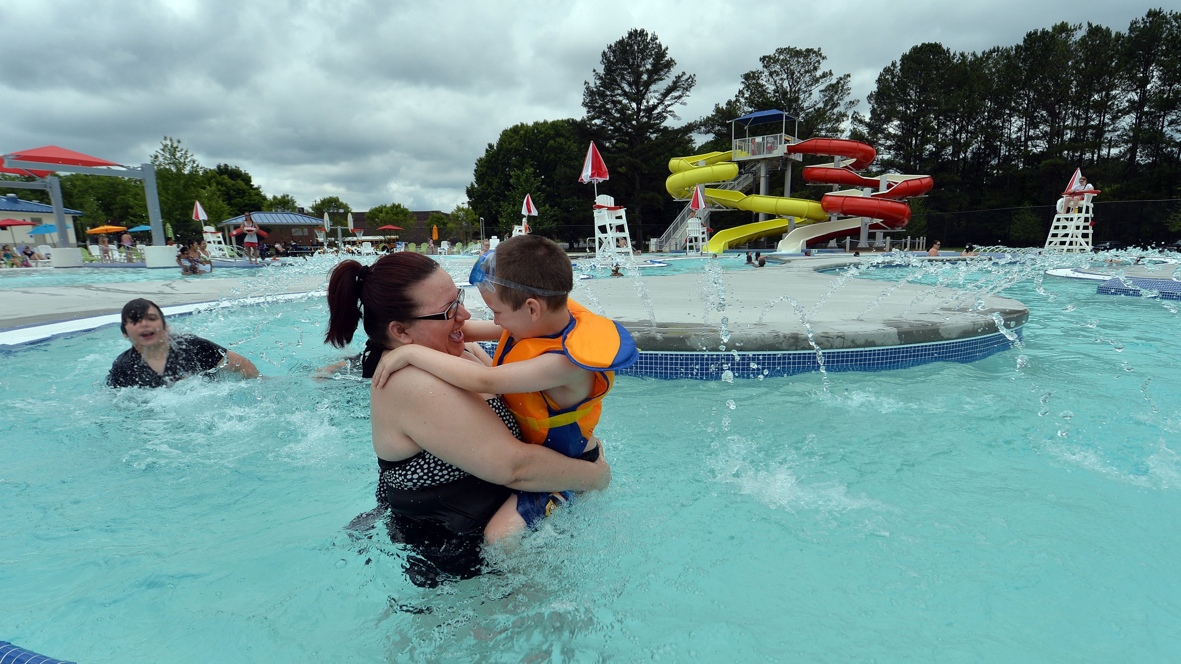 Deanna Thrasher and her son, Landon, 5, enjoy floating down the Lazy River in the Seven Springs Water Park in Powder Springs in summer 2015. KENT D. JOHNSON /KDJOHNSON@AJC.COM