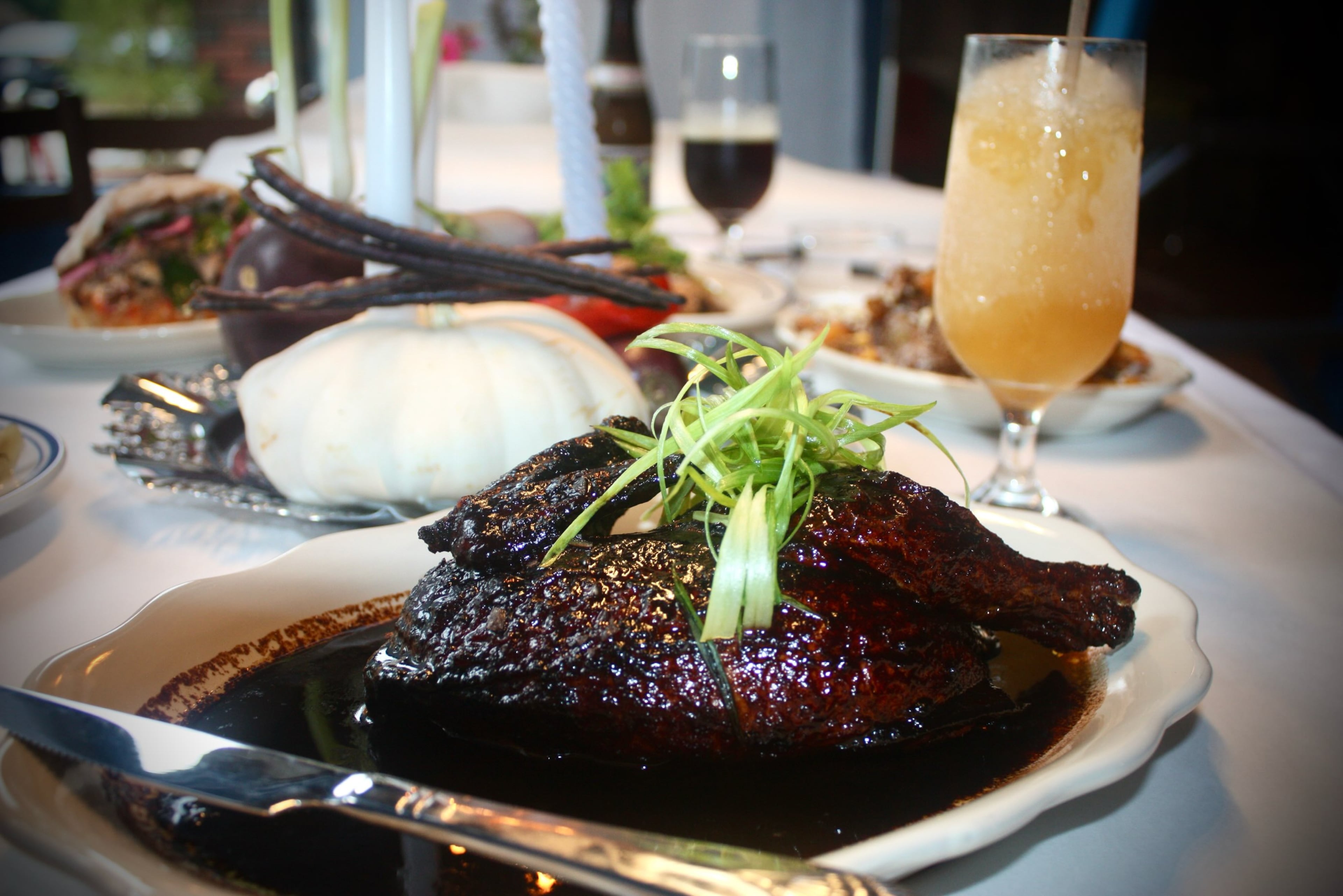 The half chicken at Last Dance is bathed in gyoza sauce. (Courtesy of Kathryn Fitzgerald/Last Dance)