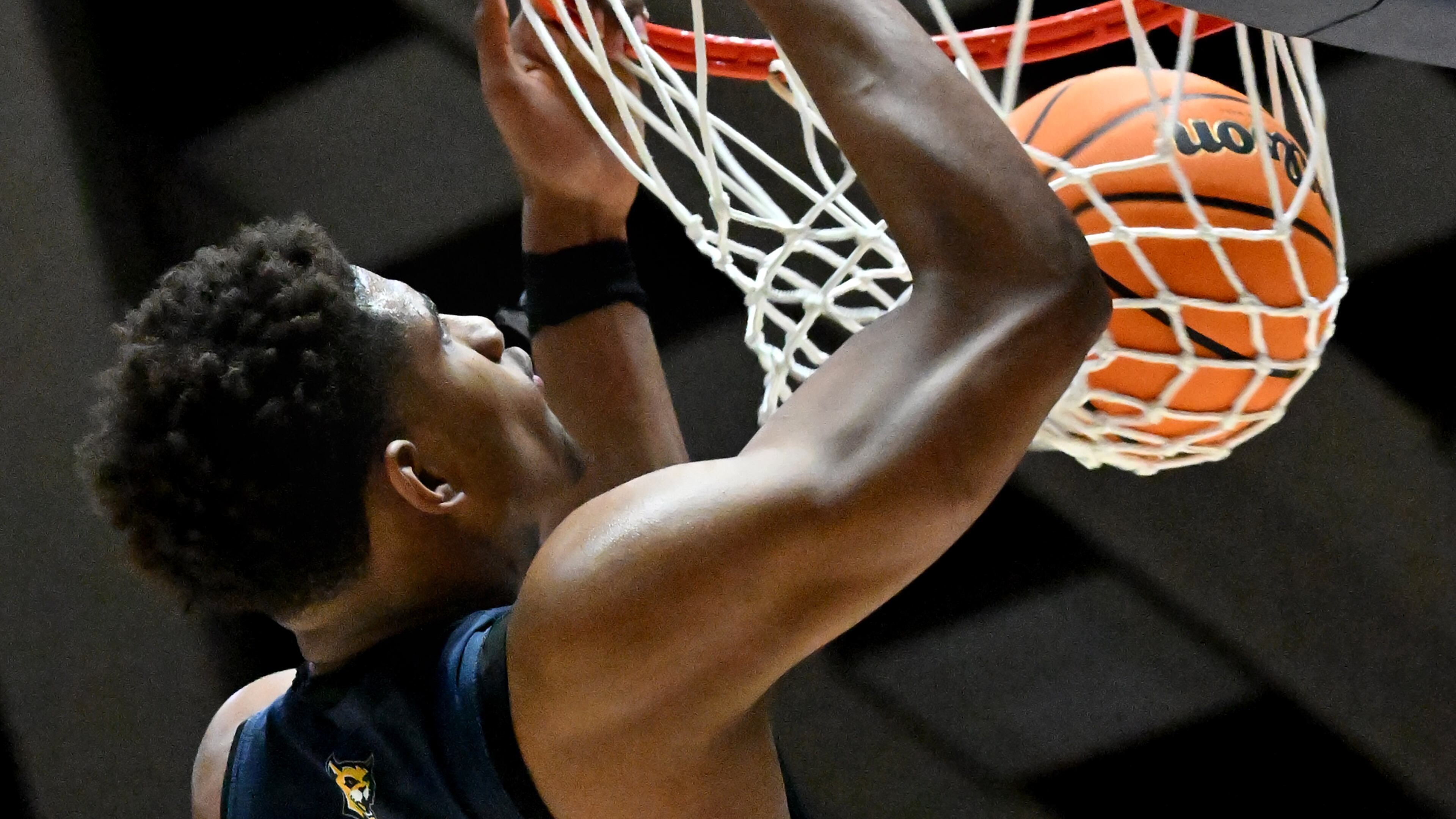 Wheeler's Arrinten Page (22) dunks the ball during 2023 GHSA Basketball Class 7A Boy’s State Championship game at the Macon Centreplex, Saturday, March 11, 2023, in Macon, GA. (Hyosub Shin / Hyosub.Shin@ajc.com)