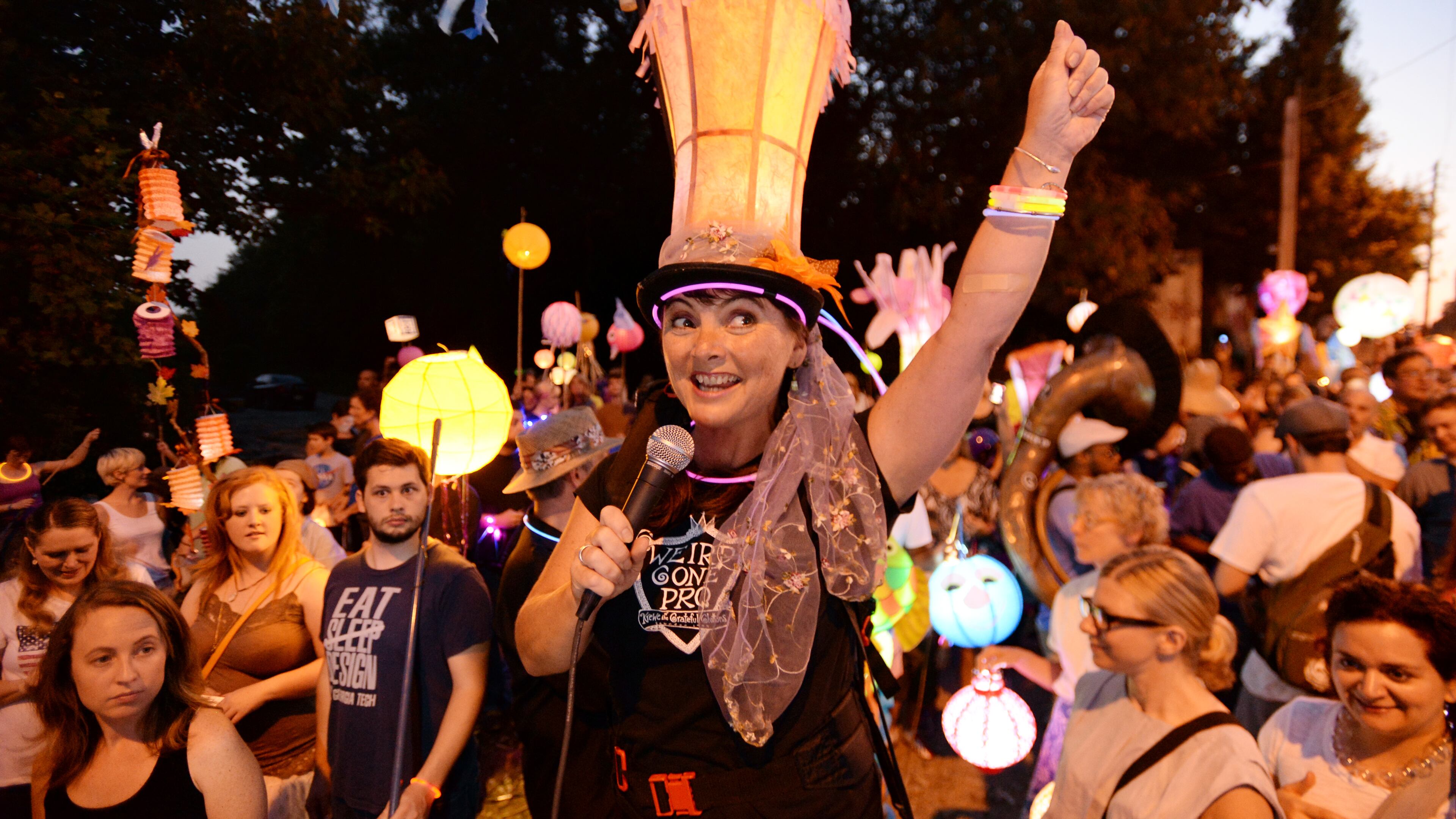 Chantelle cheers as she speaks to the crowd before the parade.