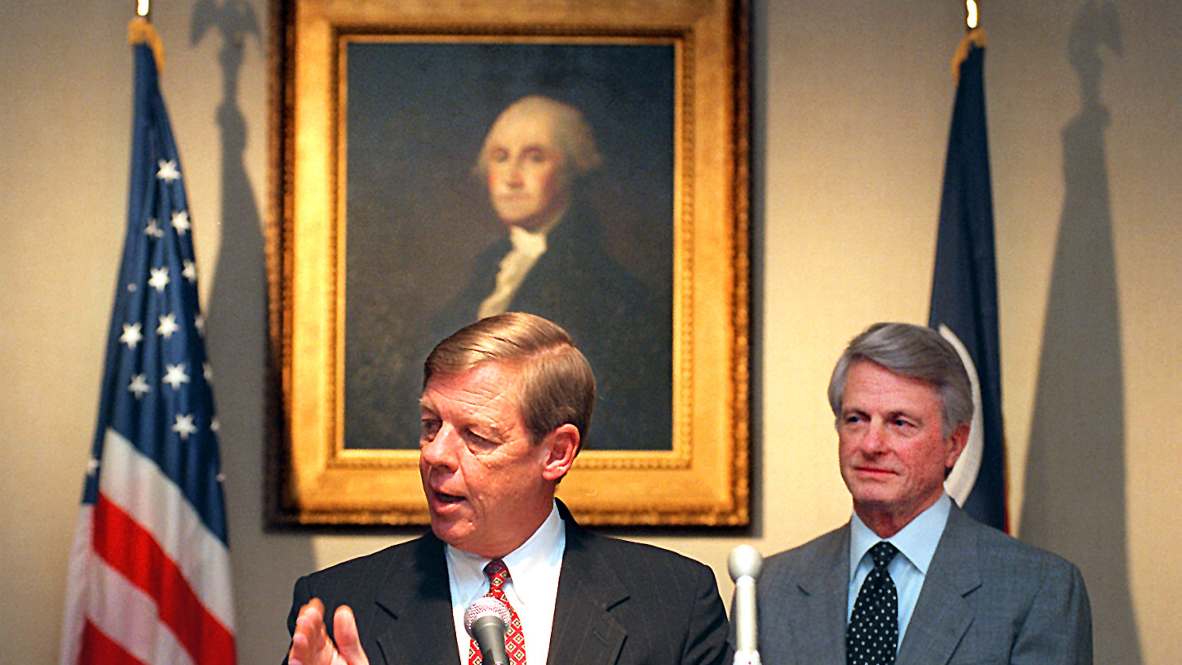 961211. ATLANTA, GA. Johnny Isakson answers questions at the Governor's Mansion Wednesday, 12/11/96, about his appointment to the chair of the State Board of Education. Gov. Zell Miller, in the background, made the announcement of Isakson and other new board members. RICH ADDICKS/STAFF.