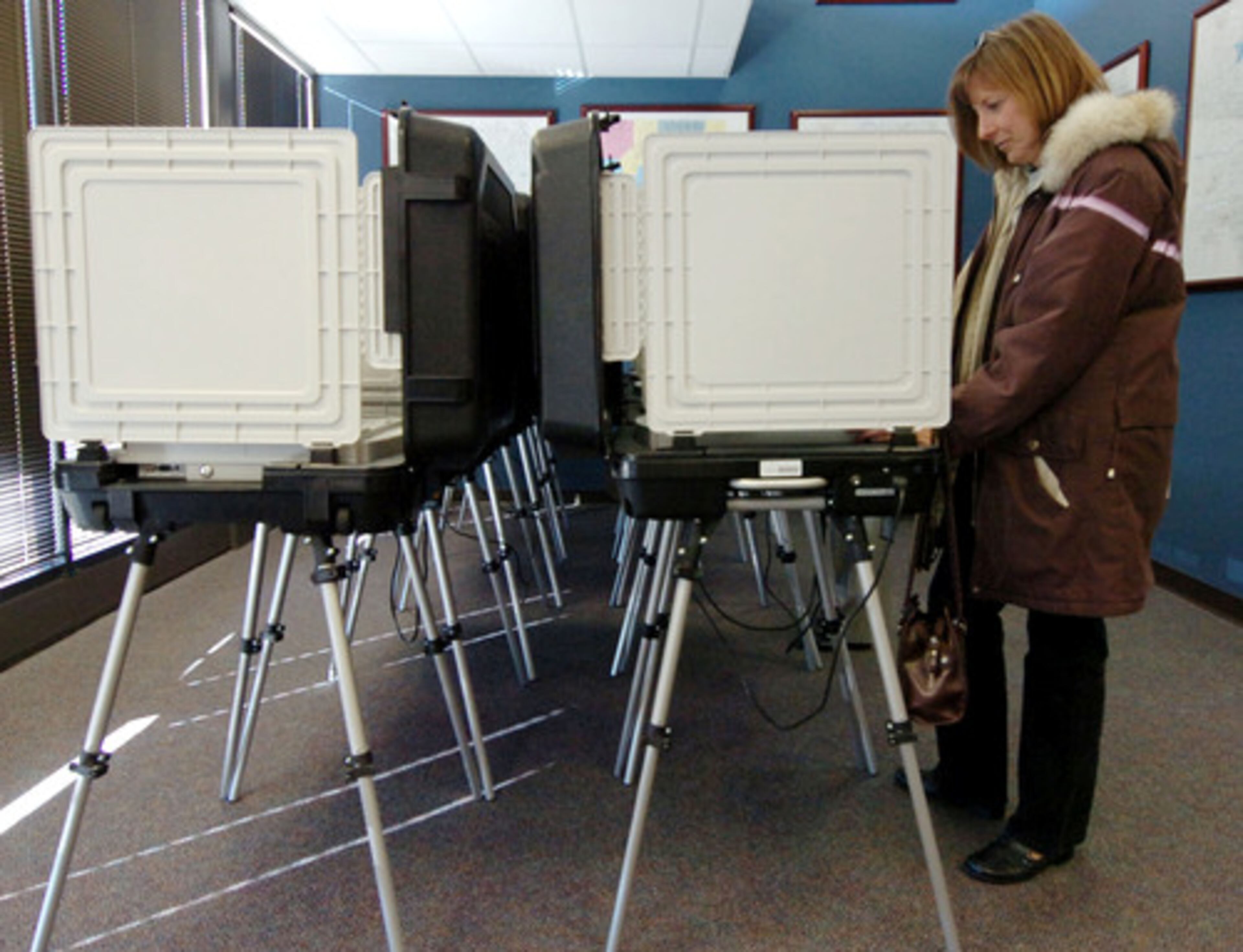 Barbara Stevens of Marietta votes Wednesday at Cobb's main elections office on Whitlock Avenue in Marietta.