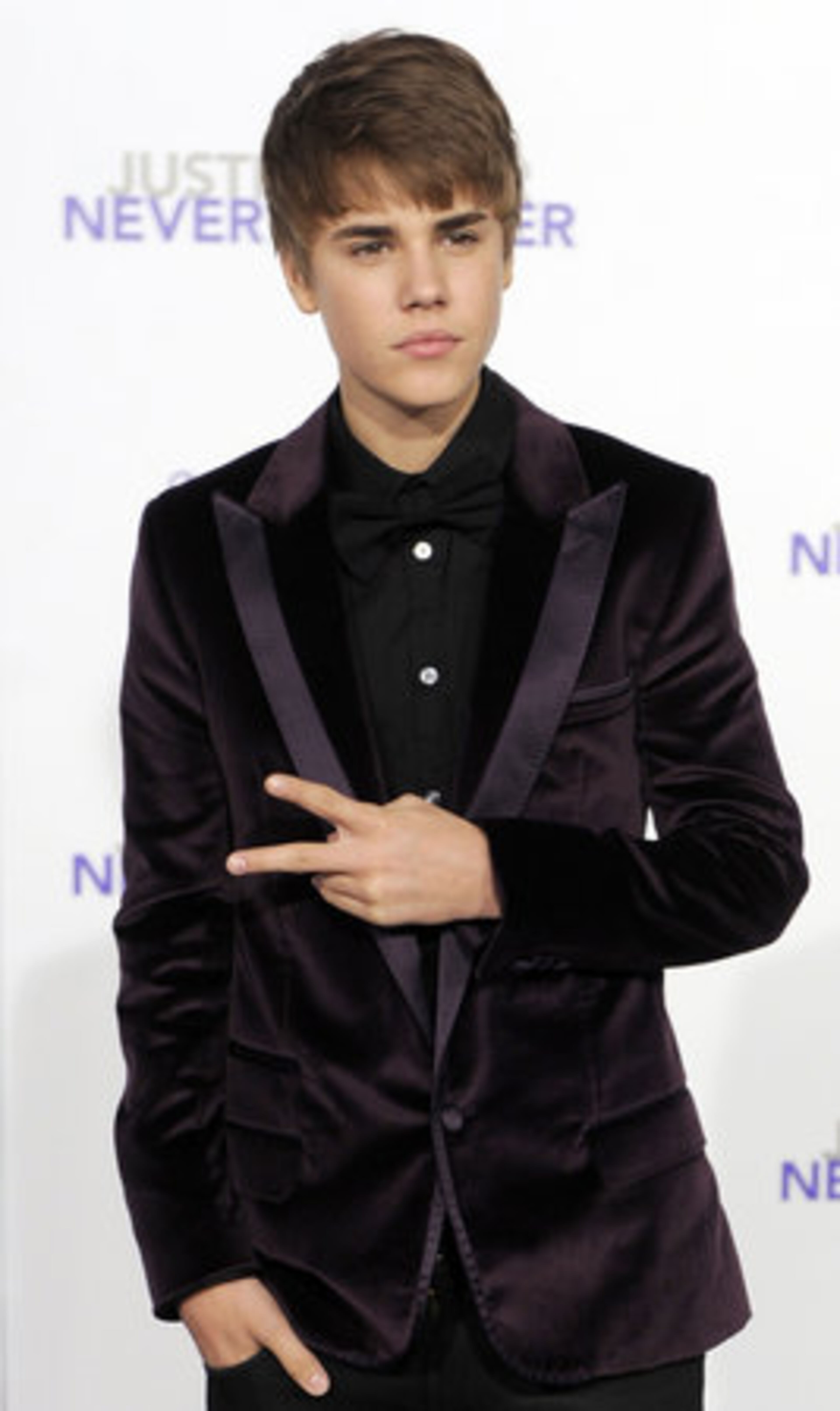 Justin Bieber attempts to look tough and fails adorably.