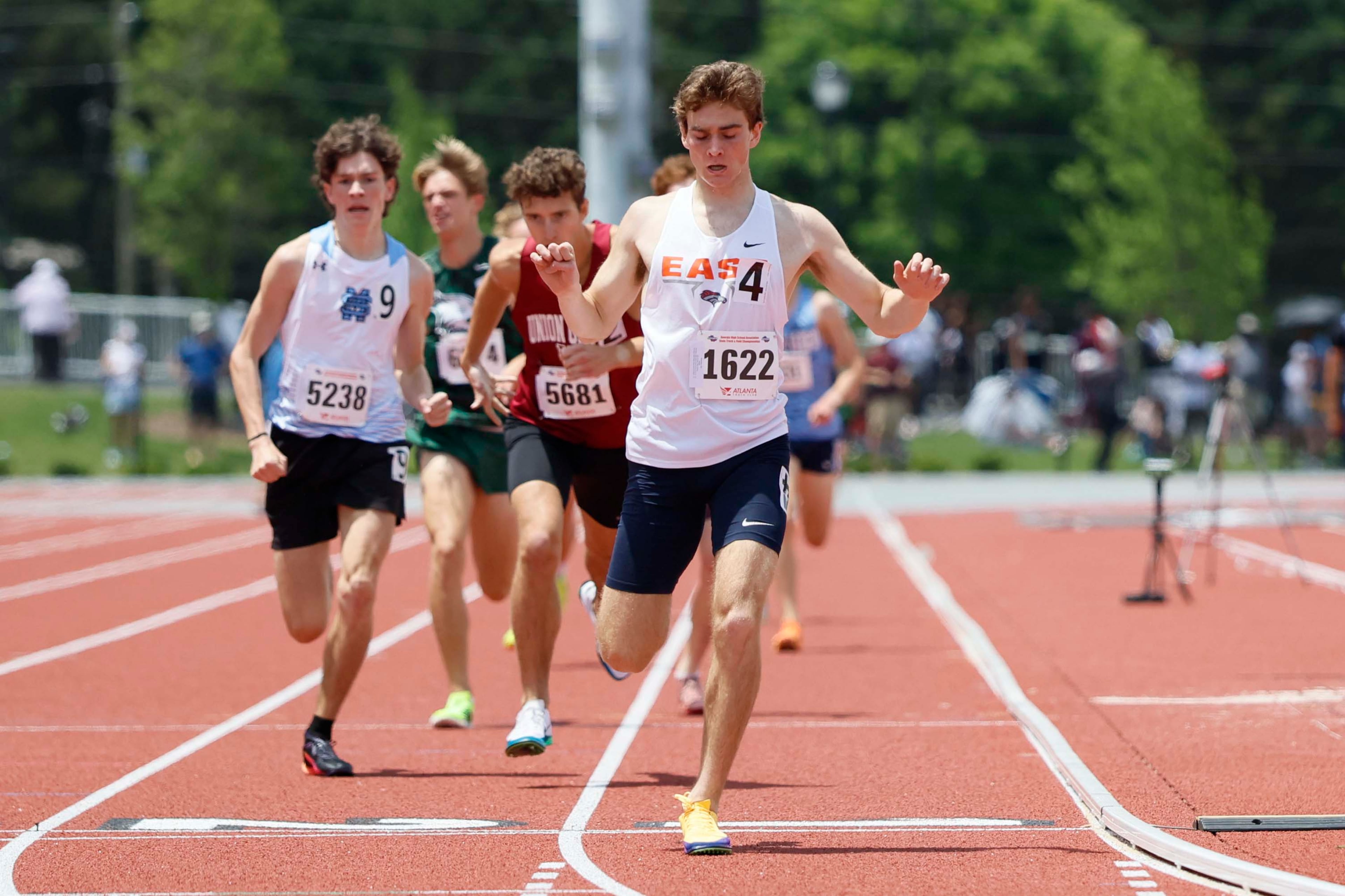East Forsyth High School’s Josh Wineland crosses the finish line to win the Boys 1600-meter Run AAAA at the GHSA track and field state championships at UGA Spec Towns Track on Monday, May 11, 2026, in Athens.
(Miguel Martinez/AJC)
