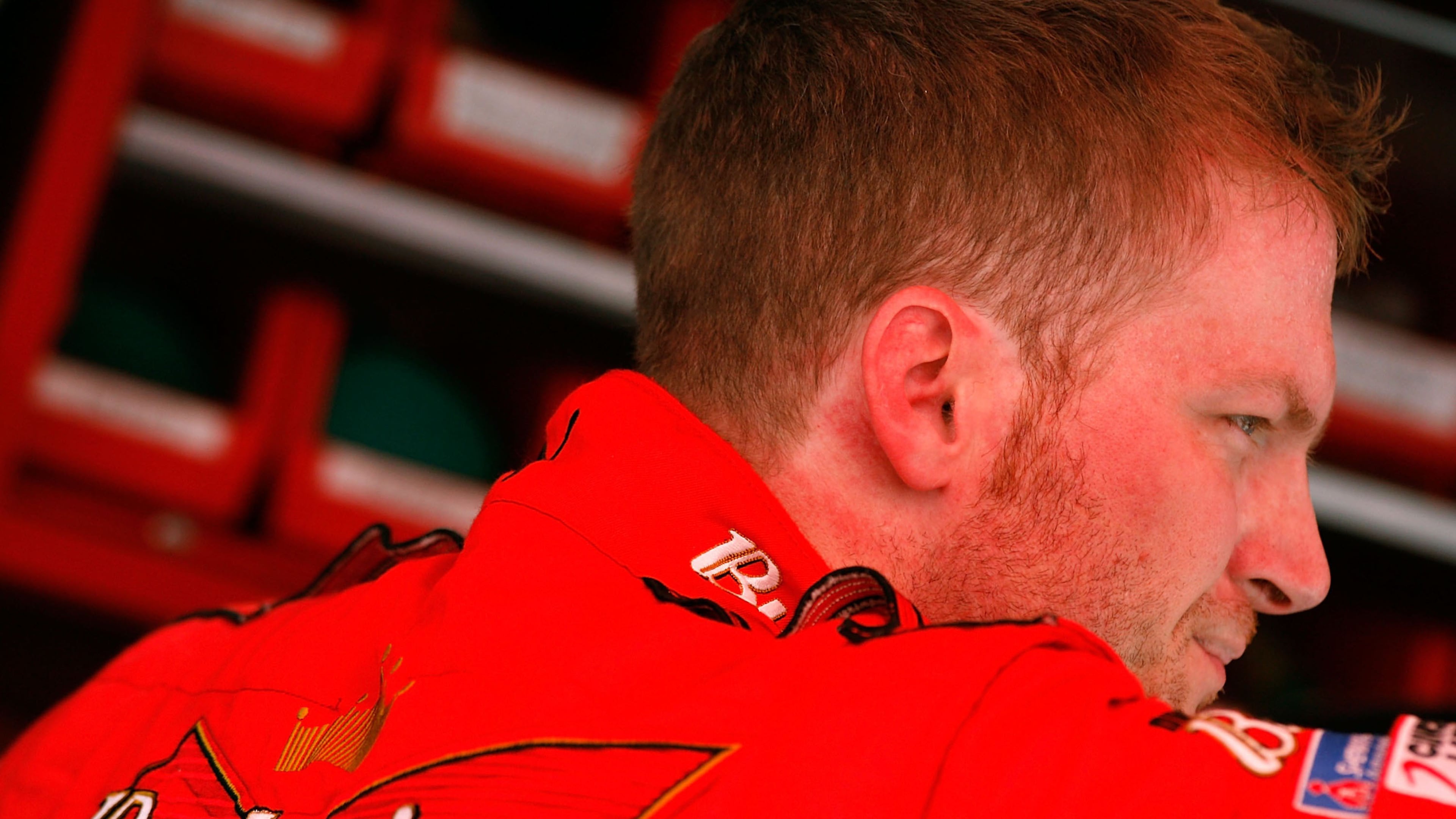 BRISTOL, TN - AUGUST 24: Dale Earnhardt Jr., driver of the #8 Budweiser Chevrolet, stands in the garage area during practice for the NASCAR Nextel Cup Series Sharpie 500 at Bristol Motor Speedway on August 24, 2007 in Bristol, Tennessee. (Photo by Kevin C. Cox/Getty Images for NASCAR)