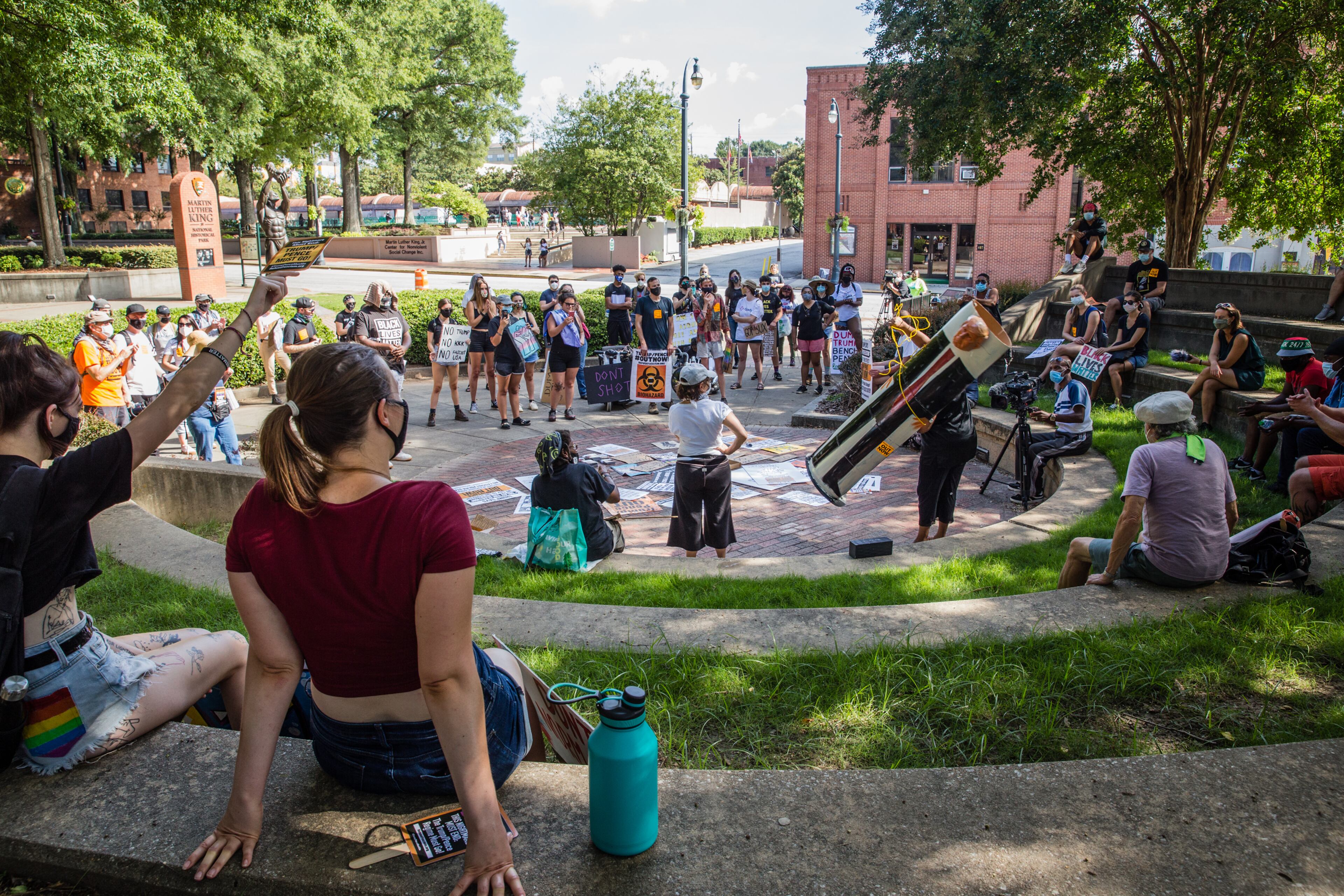 Protesters gather at Ebenezer Baptist Church and marched to CNN Center on Saturday, September 5, 2020. The protest started at Ebenezer Baptist Church as a political gathering, with an effigy to President Trump, posters and fliers and joined a Black Lives Matter protest at CNN Center with a heavy police escort along the way. (Jenni Girtman for The Atlanta Journal-Constitution)