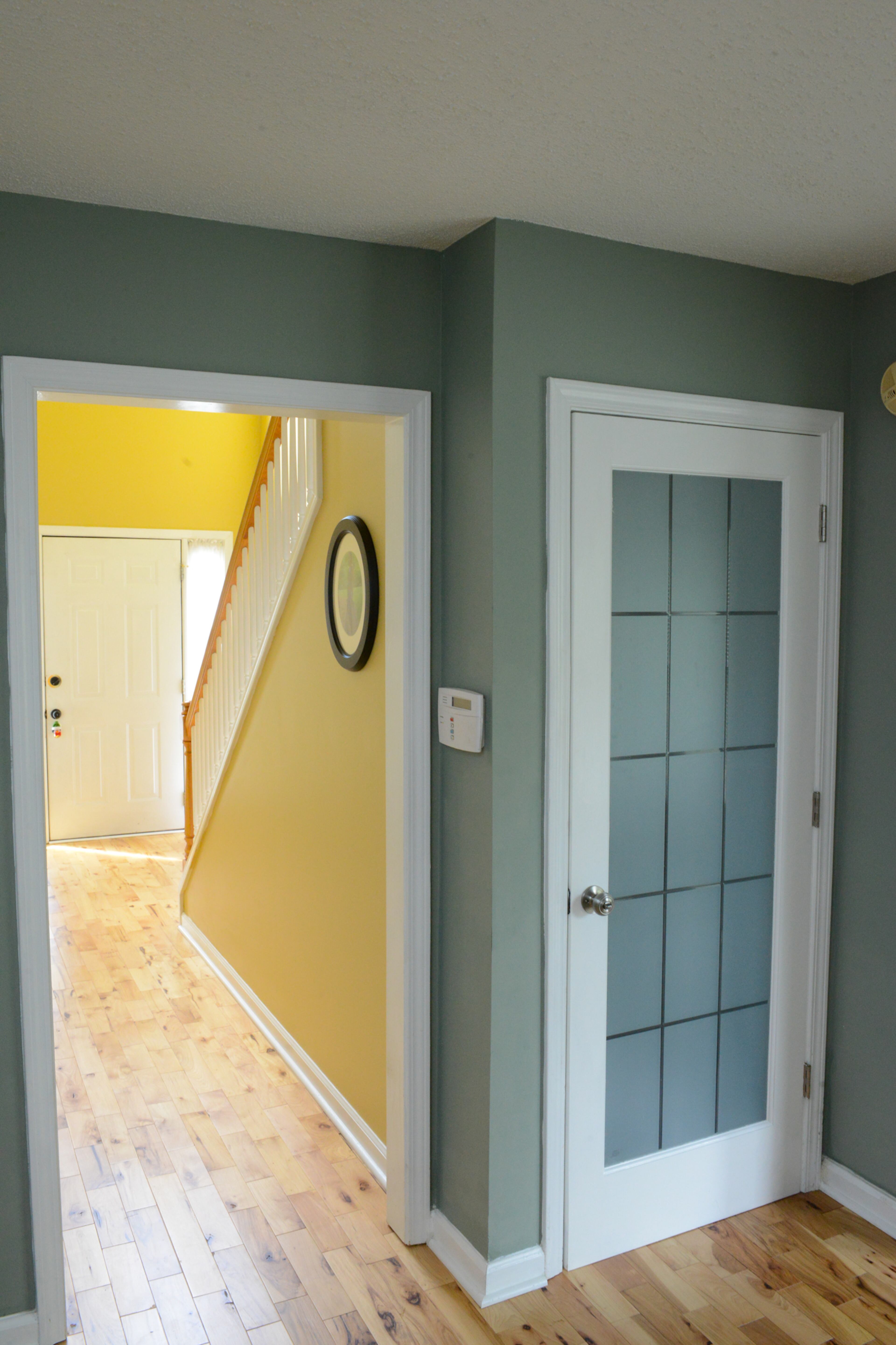During renovations last year, homeowner Shannon Joy replaced the original door to the basement stairwell with a frosted glass door.