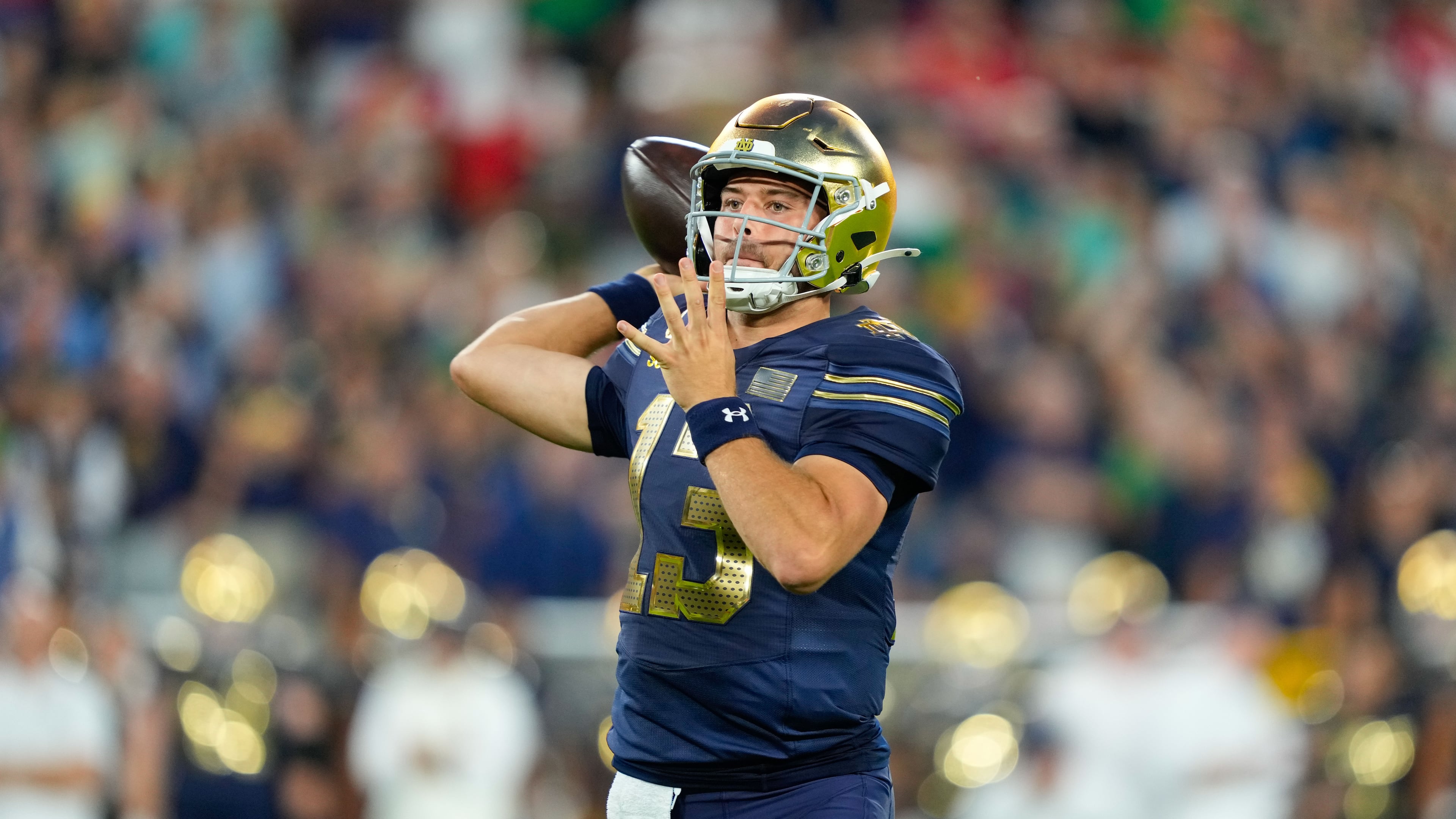 Notre Dame quarterback CJ Carr throws during the first half of an NCAA college football game against Wisconsin Sunday, Sept. 6, 2026, in Green Bay, Wis. (AP Photo/Kayla Wolf)