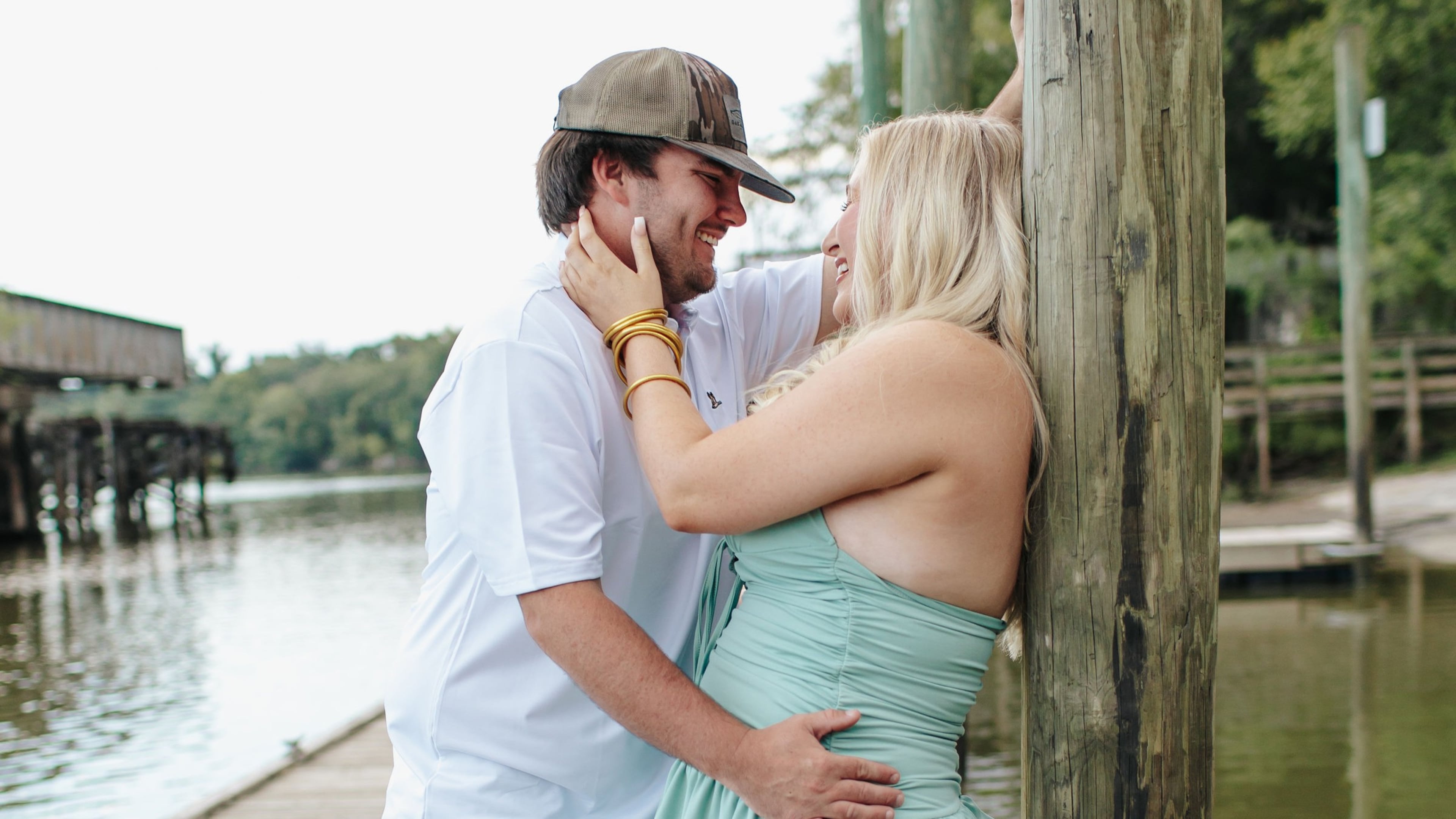Hunter Bratcher (left) poses with his match during a "stranger sessions" photo shoot, an experience designed to spark connection between two people who have never met. (Courtesy of Lanie Mae Co. Photography)