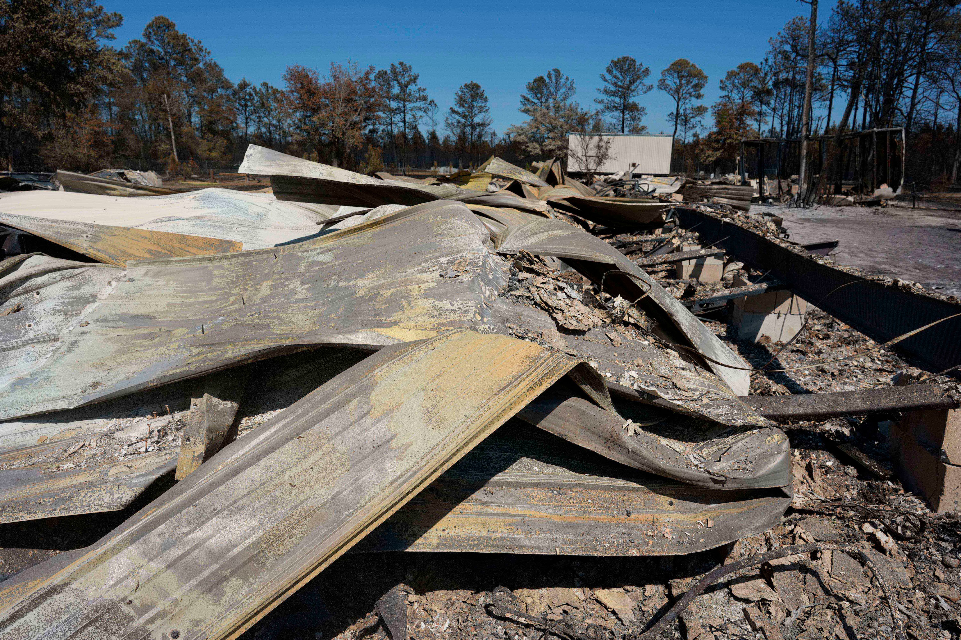 The burned out remains of the Wedding Chapel at Covenant Acres is seen near the Brantley Highway 82 fire on Thursday, April 23, 2026, near Nahunta. (Mike Stewart/AP)