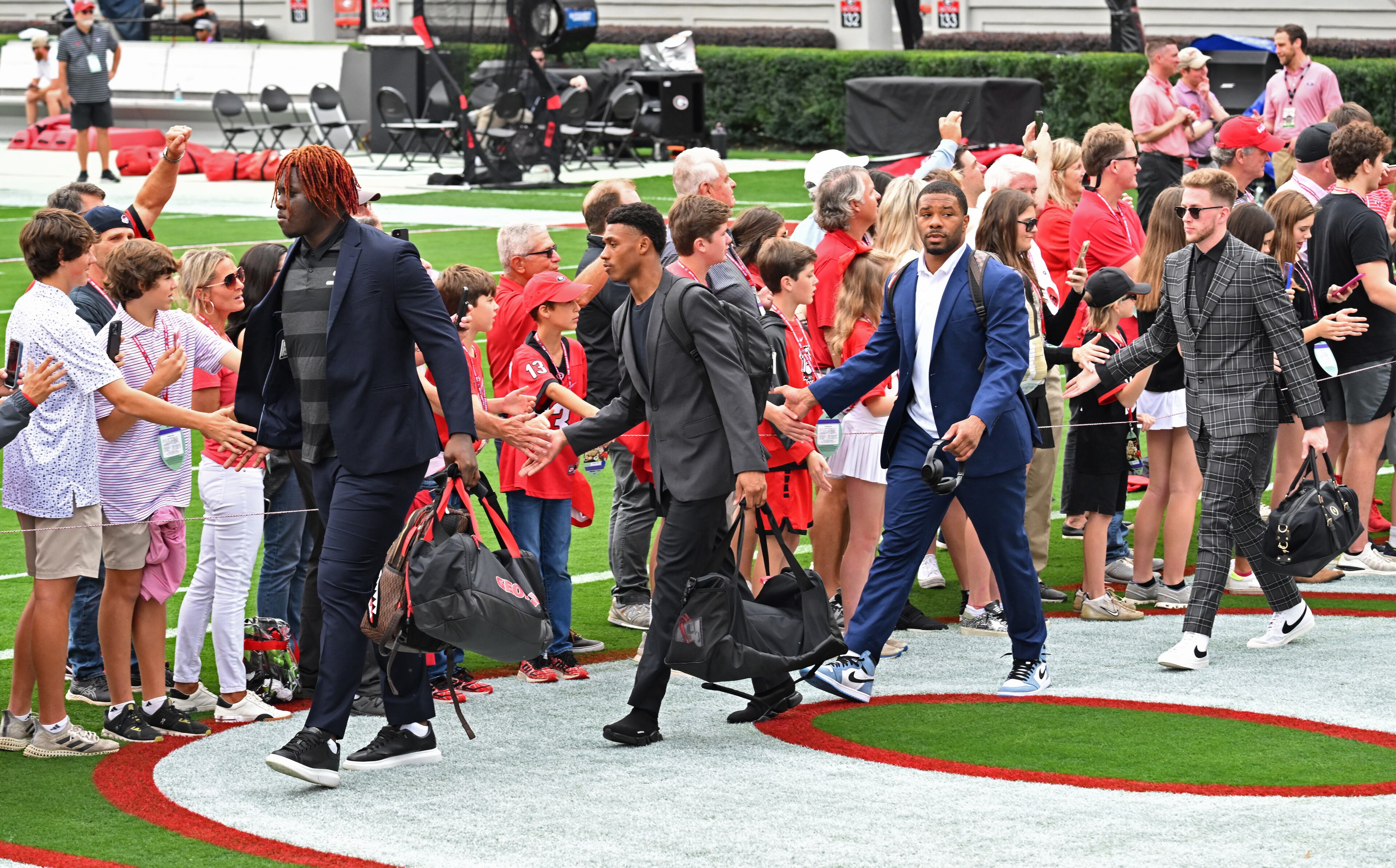 Georgia players are greeted by fans while arriving during the Dawg Walk to play Tennessee in an NCAA college football game at Sanford Stadium in Athens on Saturday, November 5, 2022. (Hyosub Shin / Hyosub.Shin@ajc.com)
