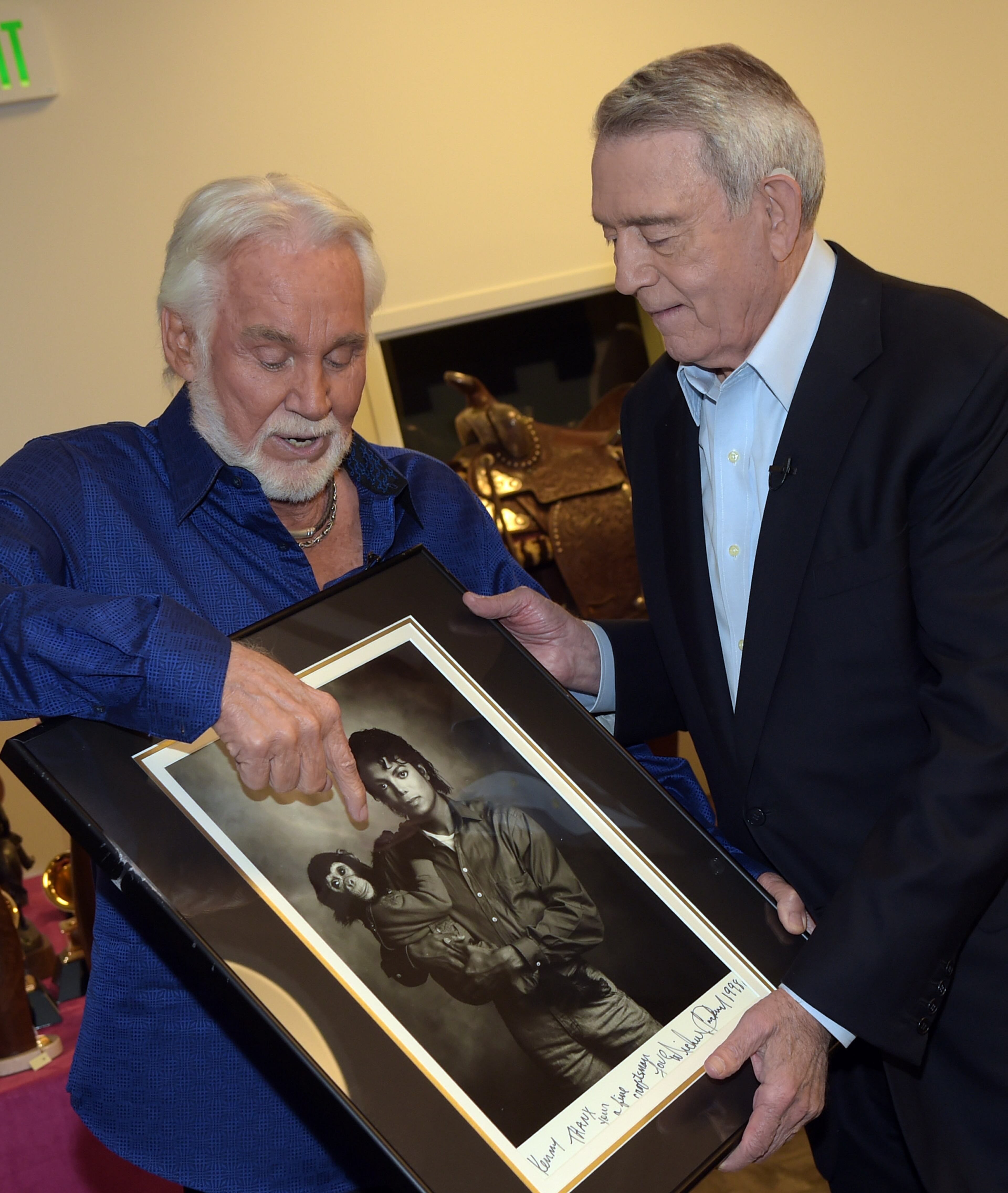 Dan Rather (right) interviews Kenny Rogers at The Country Music Hall of Fame and Museum on July 31, 2014 in Nashville. An exhibit highlighting Kenny Rogers' career will open at The Country Music Hall of Fame and Museum next month. "The Big Interview With Dan Rather" will air later this summer. (Photo by Rick Diamond/Getty Images for Dan Rather:The Big Interview)