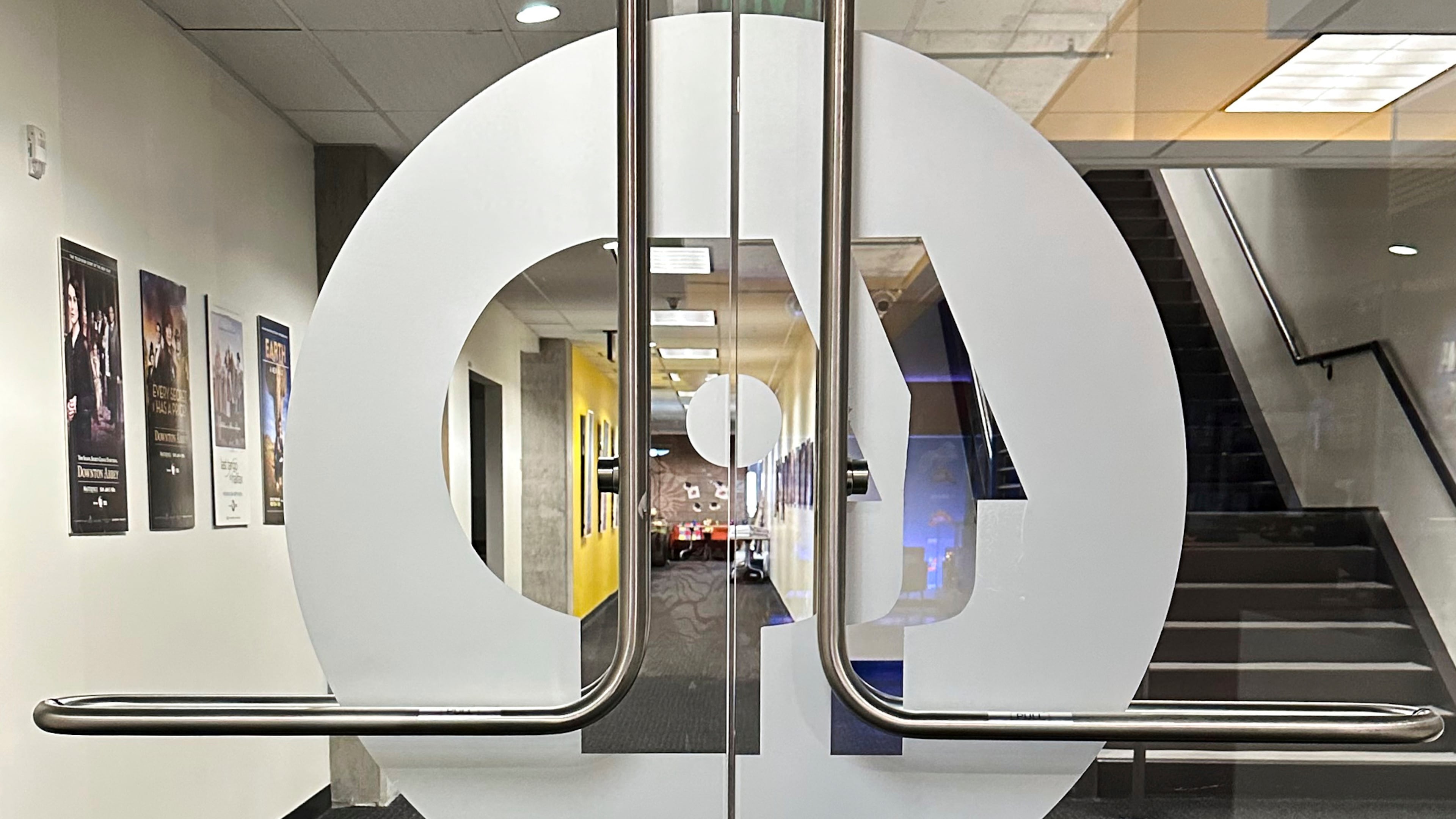 FILE - An entrance to the Arizona PBS offices in the Walter Cronkite School of Journalism and Mass Communication in Phoenix is seen, May 2, 2025. (AP Photo/Katie Oyan, File)