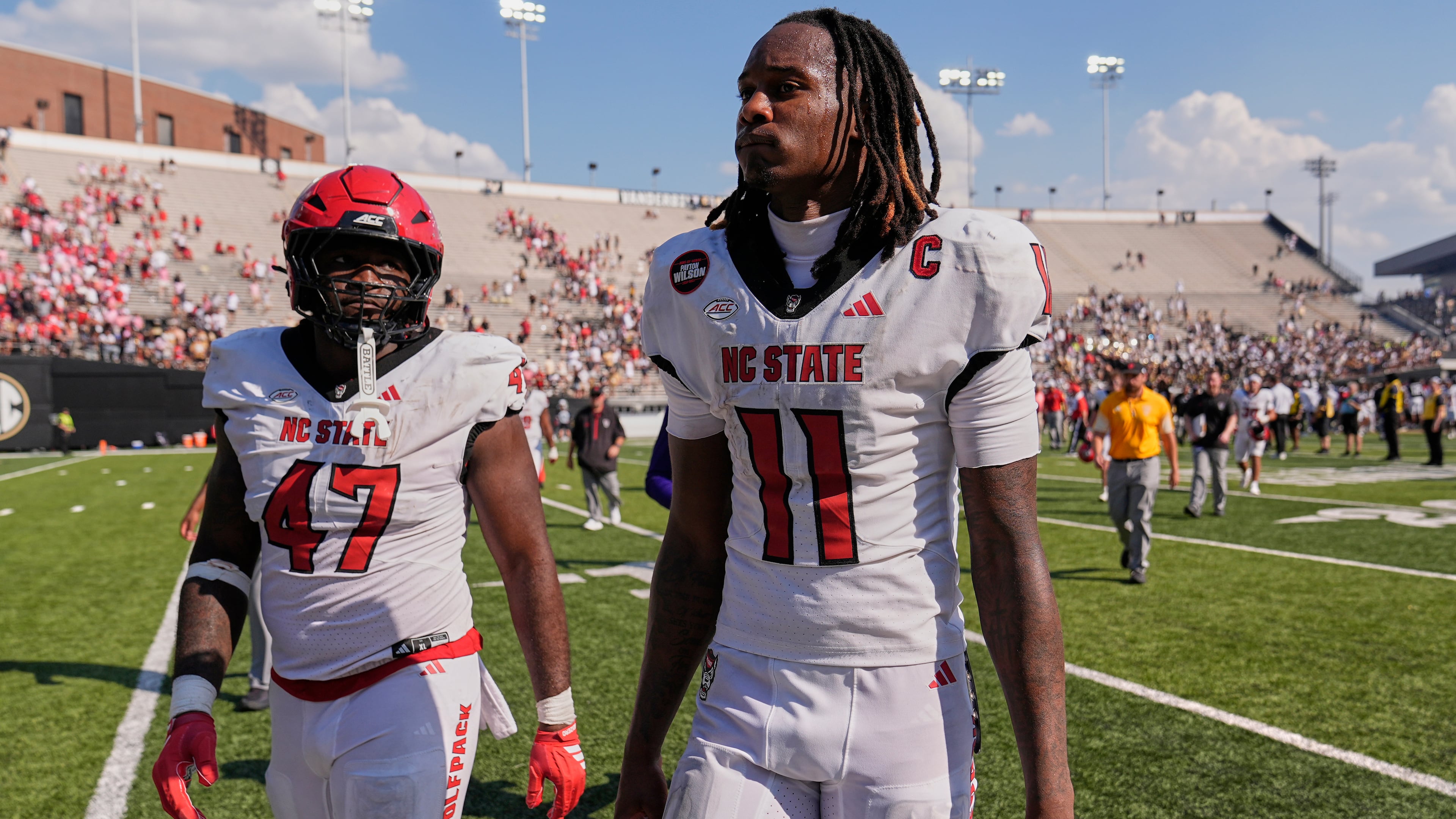 North Carolina State quarterback CJ Bailey (11) walks off the field after the team's loss in an NCAA college football game against Vanderbilt, Saturday, Sept. 19, 2026, in Nashville, Tenn. (AP Photo/George Walker IV)