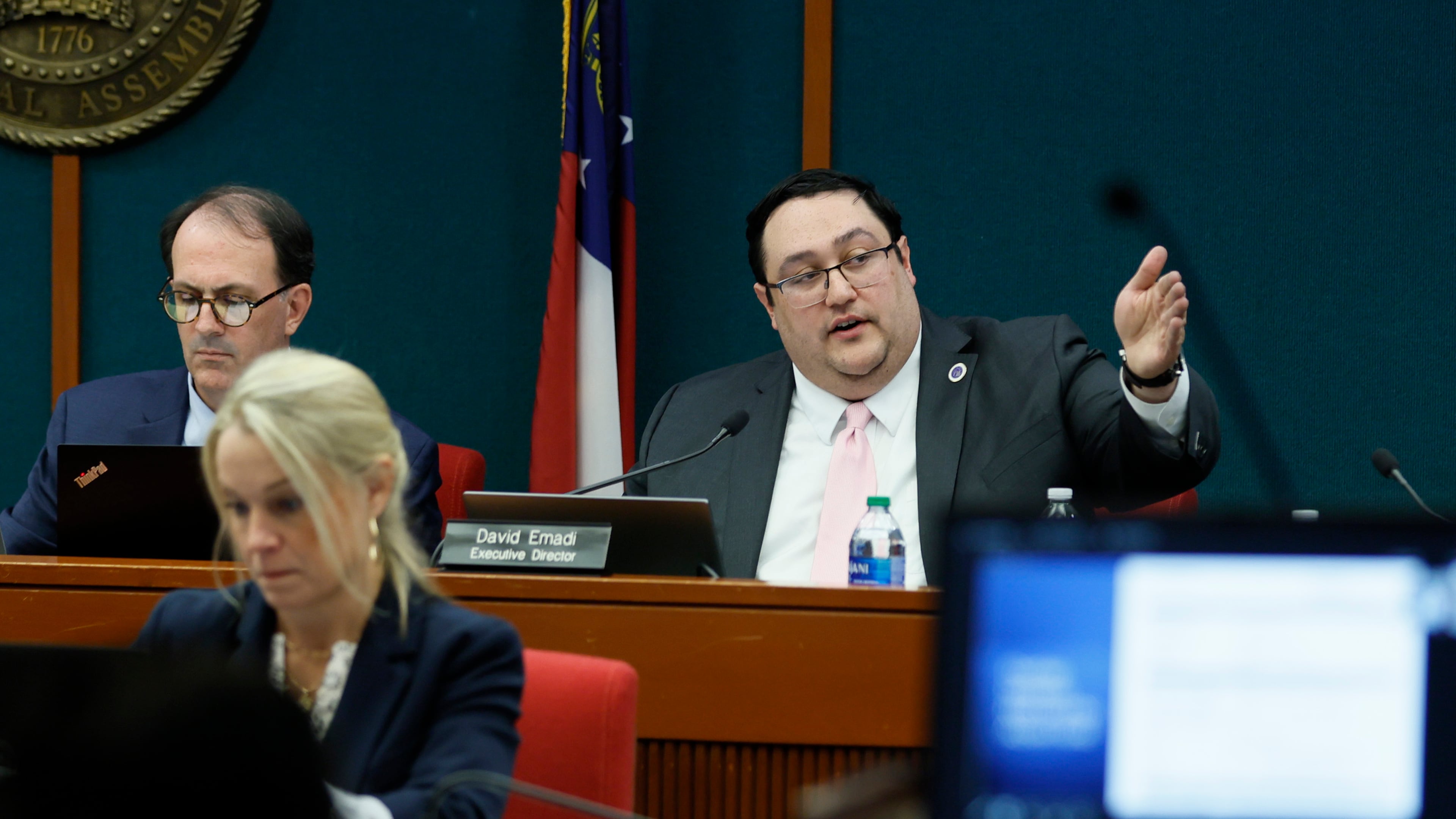 David Emadi, the executive director of the State Ethics Commission, points at the screen during his presentation at the Ethics Commission meeting held at the Coverdell Legislative Office Building on Wednesday, Jan. 15, 2025. A voting rights group founded by Stacey Abrams will pay $300,000 for unlawfully supporting her 2018 gubernatorial campaign. (Miguel Martinez/The Atlanta Journal-Constitution/TNS)