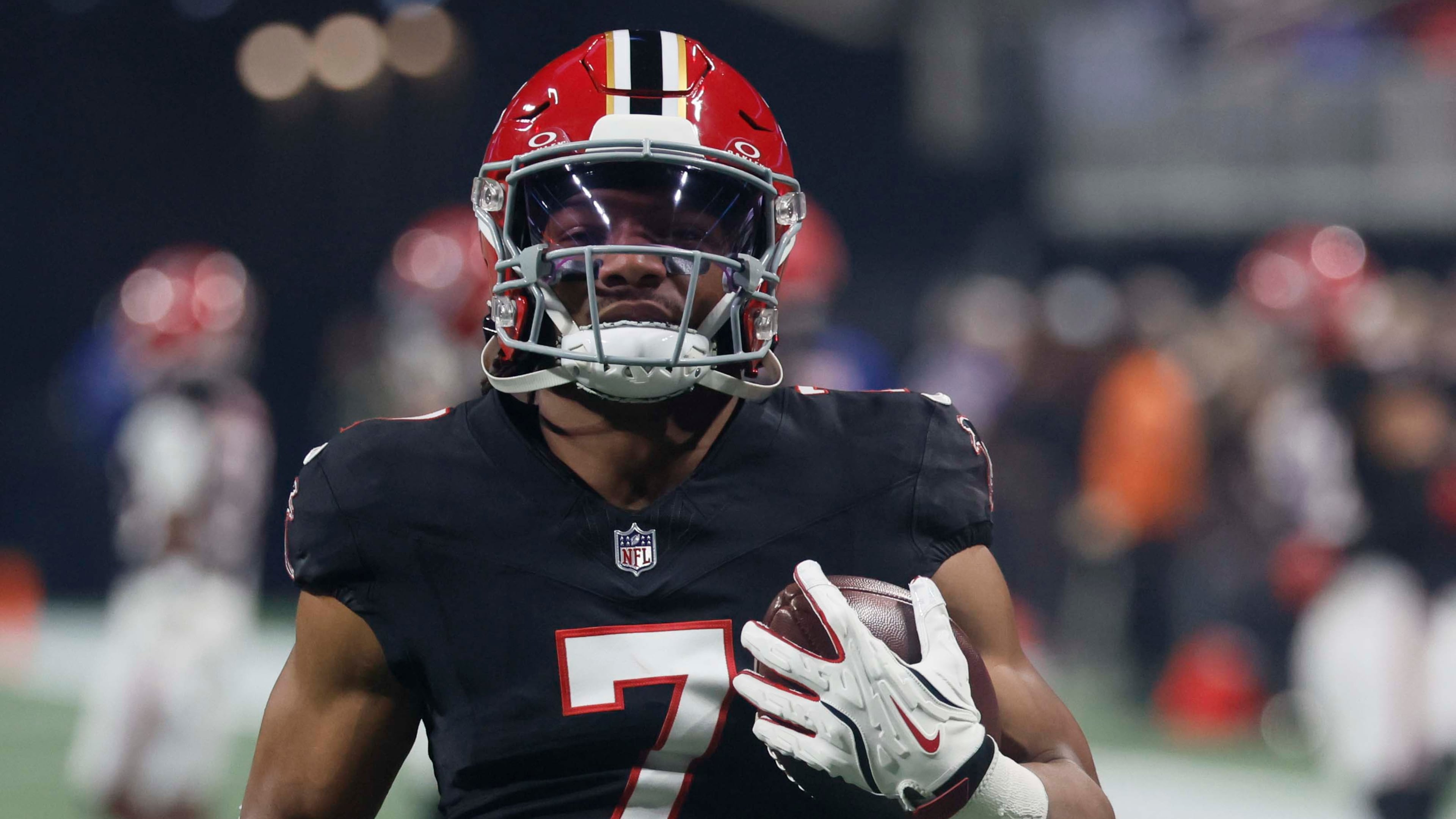 Atlanta Falcons running back Bijan Robinson runs with the ball during warm-ups before the game against the Los Angeles Rams at Mercedes-Benz Stadium in Atlanta on Monday, Dec. 29, 2025. (Miguel Martinez/AJC)