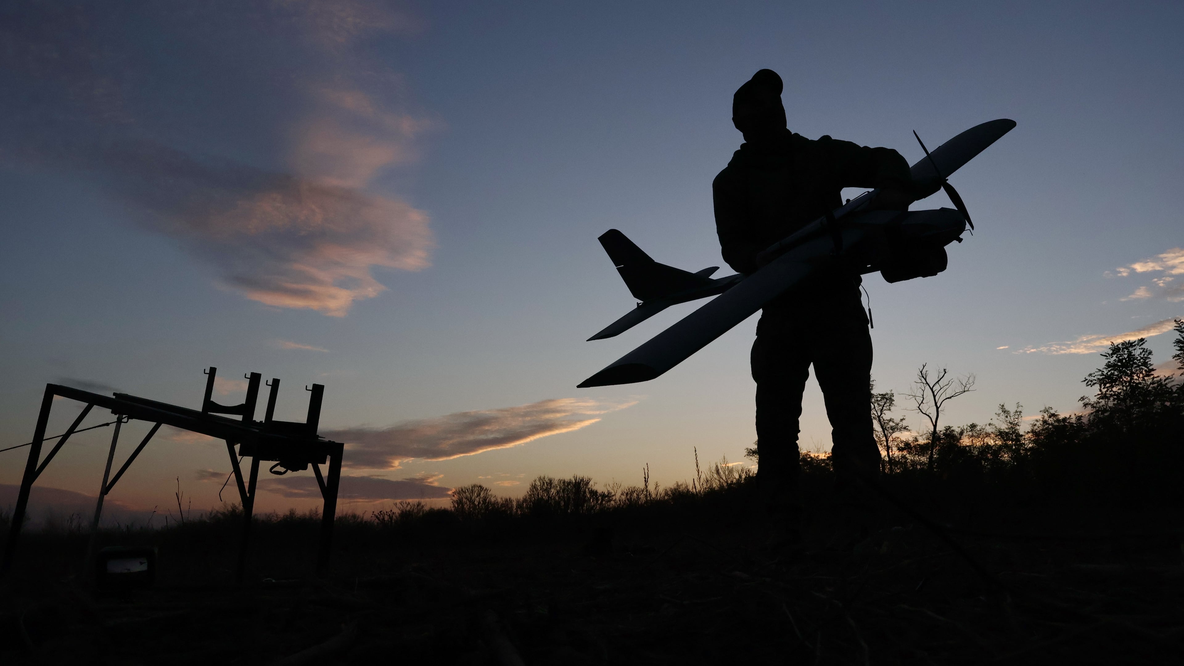In this photo provided by Ukraine's 65th Mechanized Brigade press service, A Ukrainian serviceman launches a drone towards Russian positions at the front line in the Zaporizhzhia region, Ukraine, Wednesday Oct. 7, 2026. (Andriy Andriyenko/Ukraine's 65th Mechanized Brigade via AP)