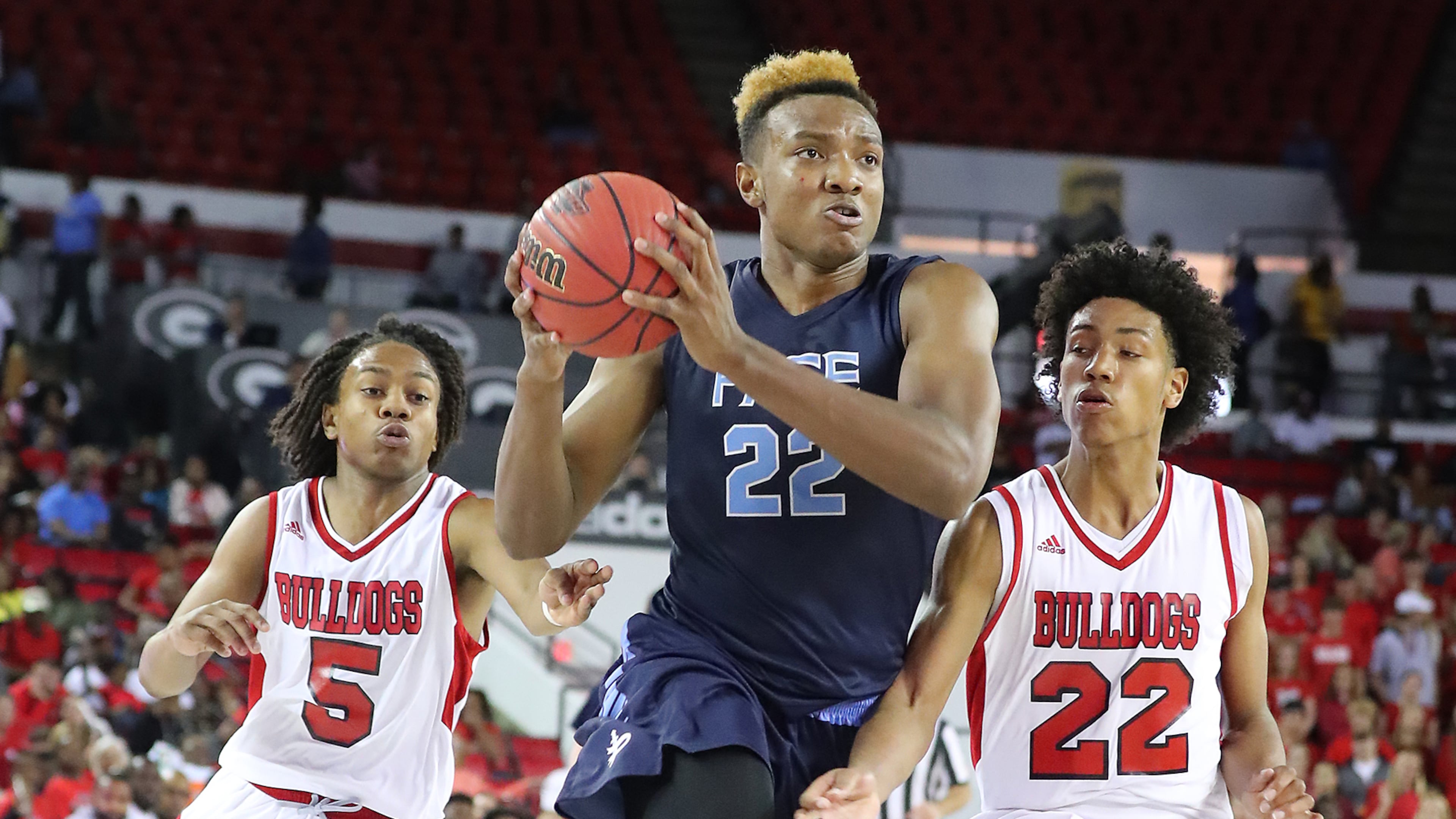 Pace Academy center Wendell Carter drives to the basket past Morgan County defenders Stevin Green (left) and Alec Woodard in their Class AAA boys state basketball championship game on Thursday, March 9, 2017, in Athens. Curtis Compton/ccompton@ajc.com