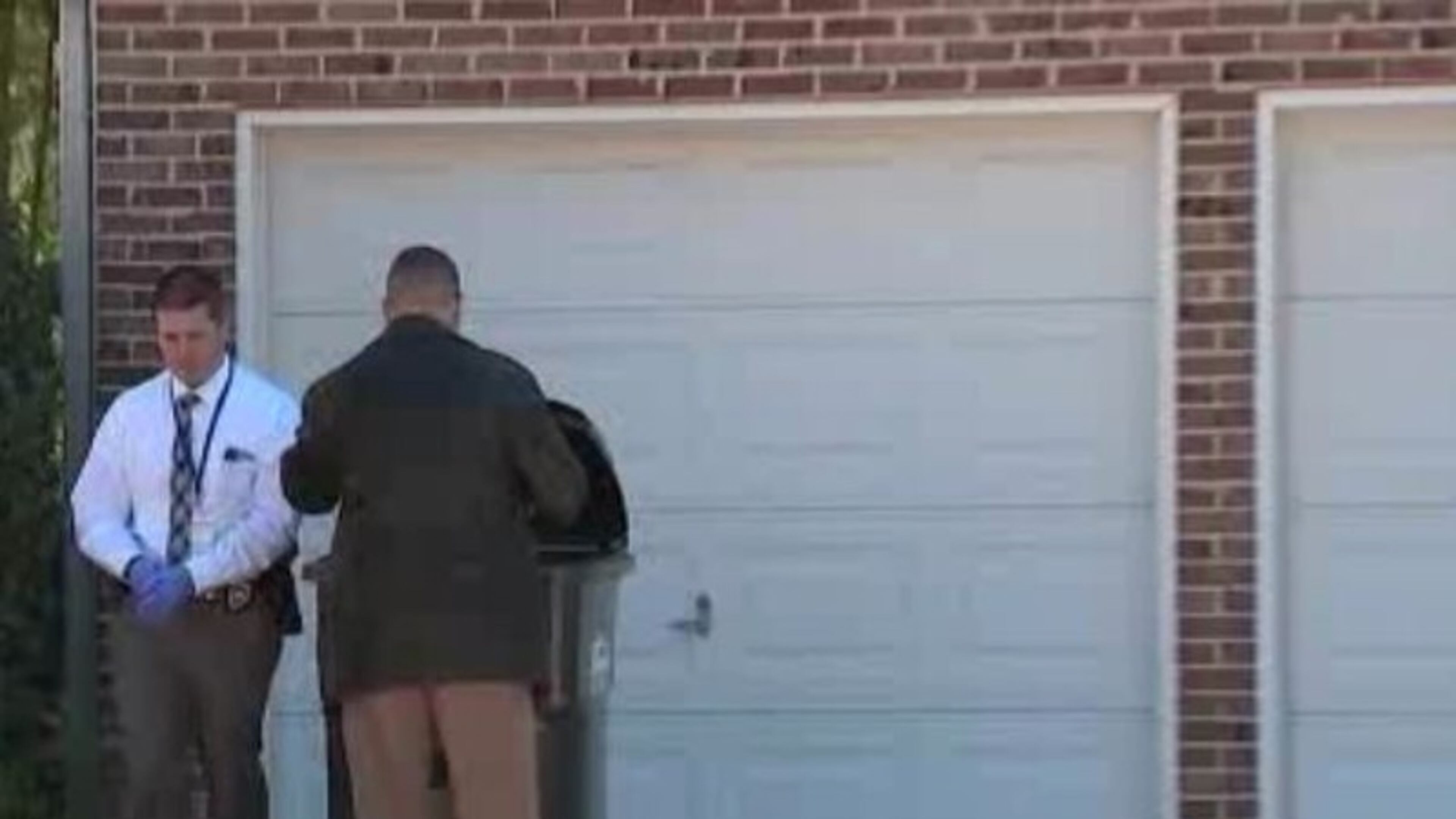 Cobb County police are investigating after a man's body was found on a porch in the Austell area.