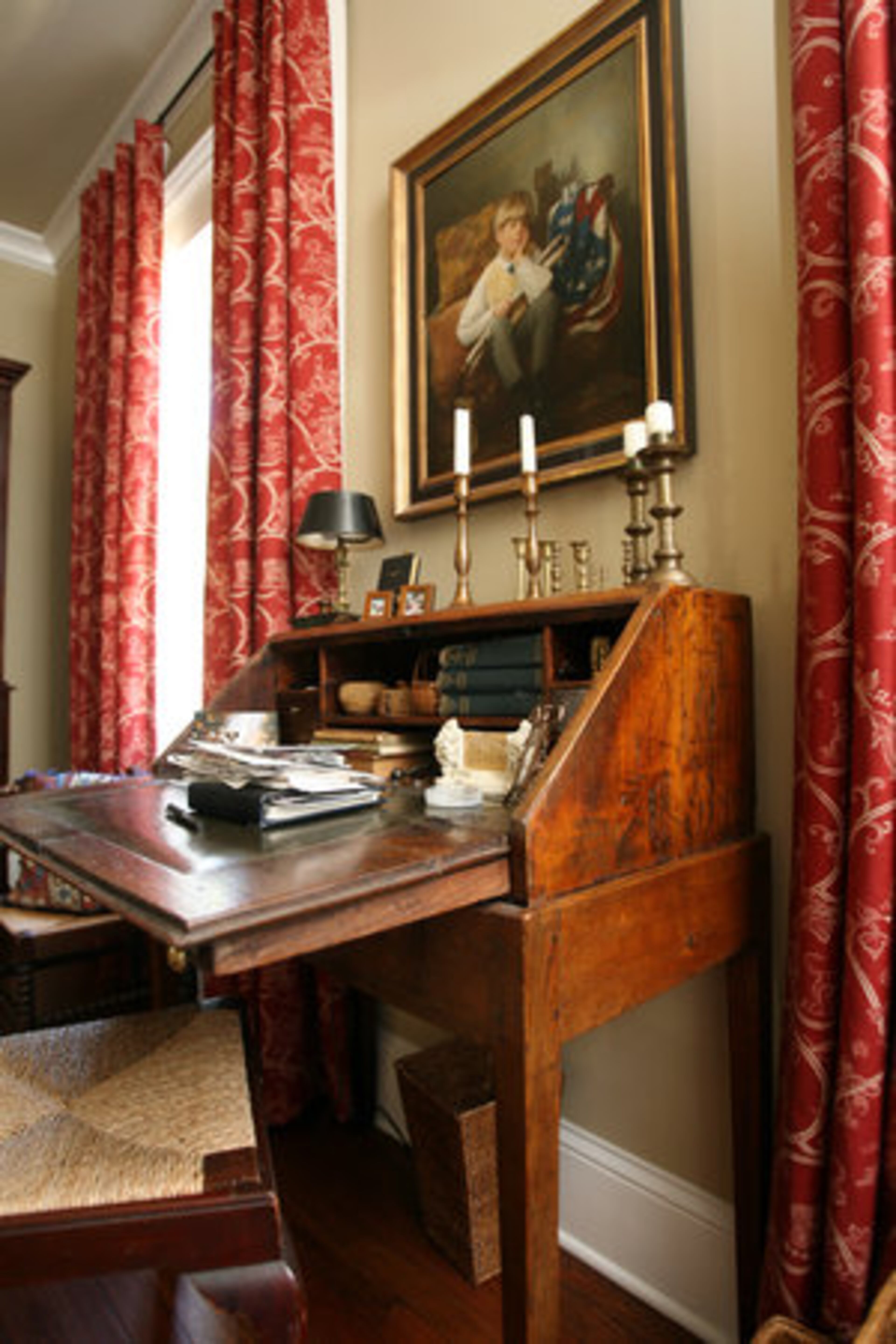 Susan Gibbs displays a portrait of her then six-year-old son above the desk in the master sitting room.