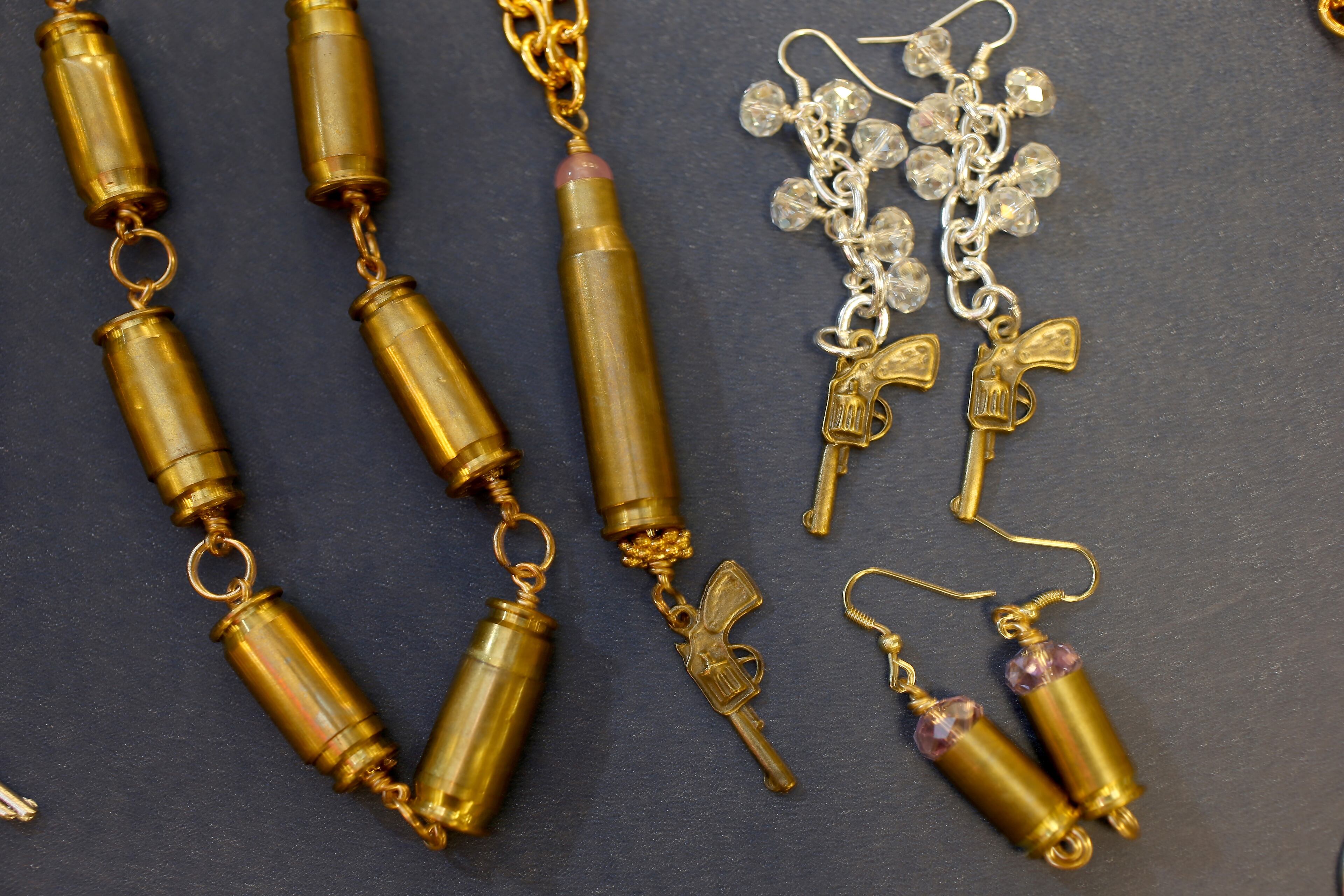 Some of the bracelets, earrings and necklaces available from Gun Girls Inc.